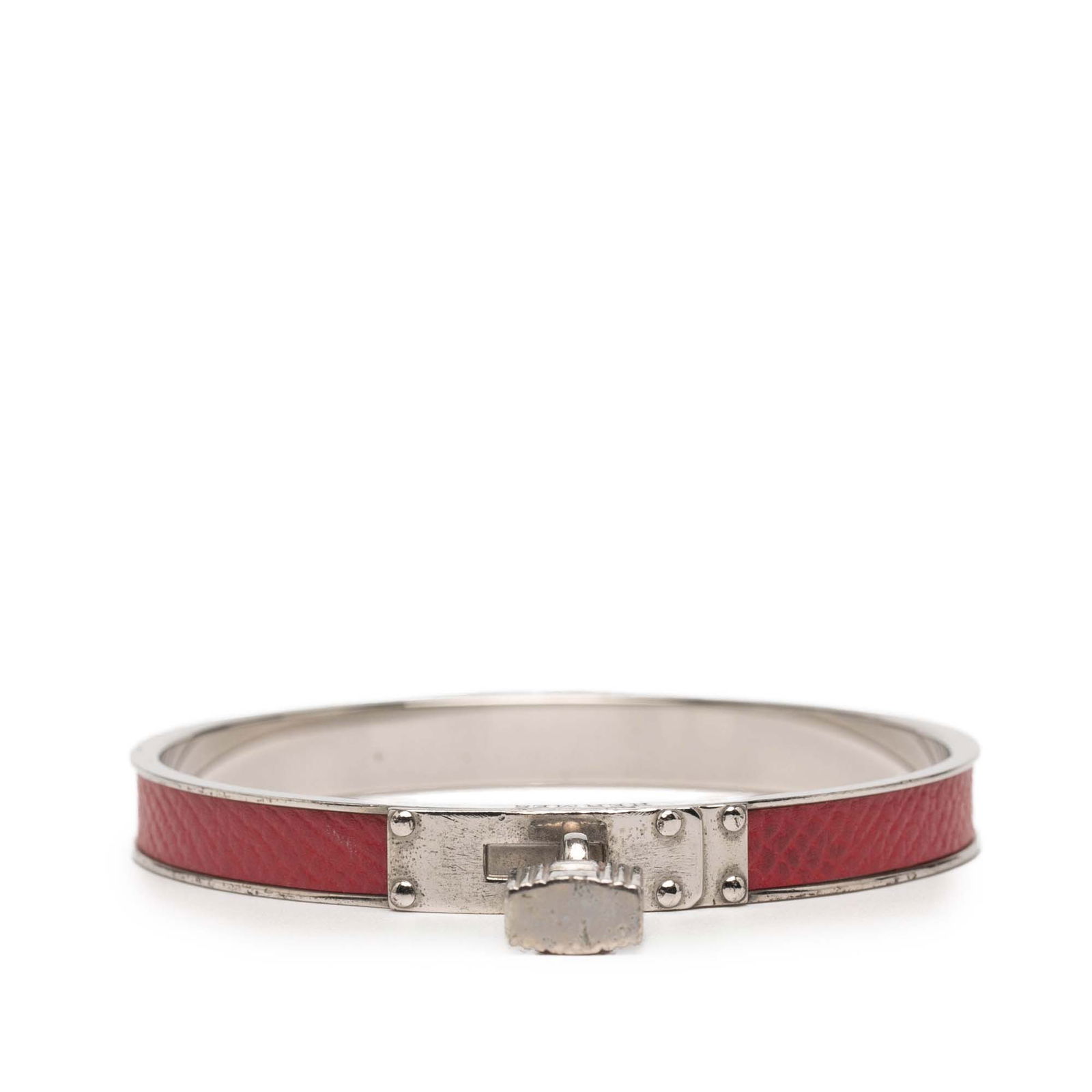 Hermes Palladium Plated Kelly H Lock Bangle Red Leather: Hermes Palladium Plated Kelly H Lock Bangle Red Leather This exquisite Hermes bangle showcases a palladium-plated metal body adorned with luxurious leather details. Crafted in France, it features a bo
