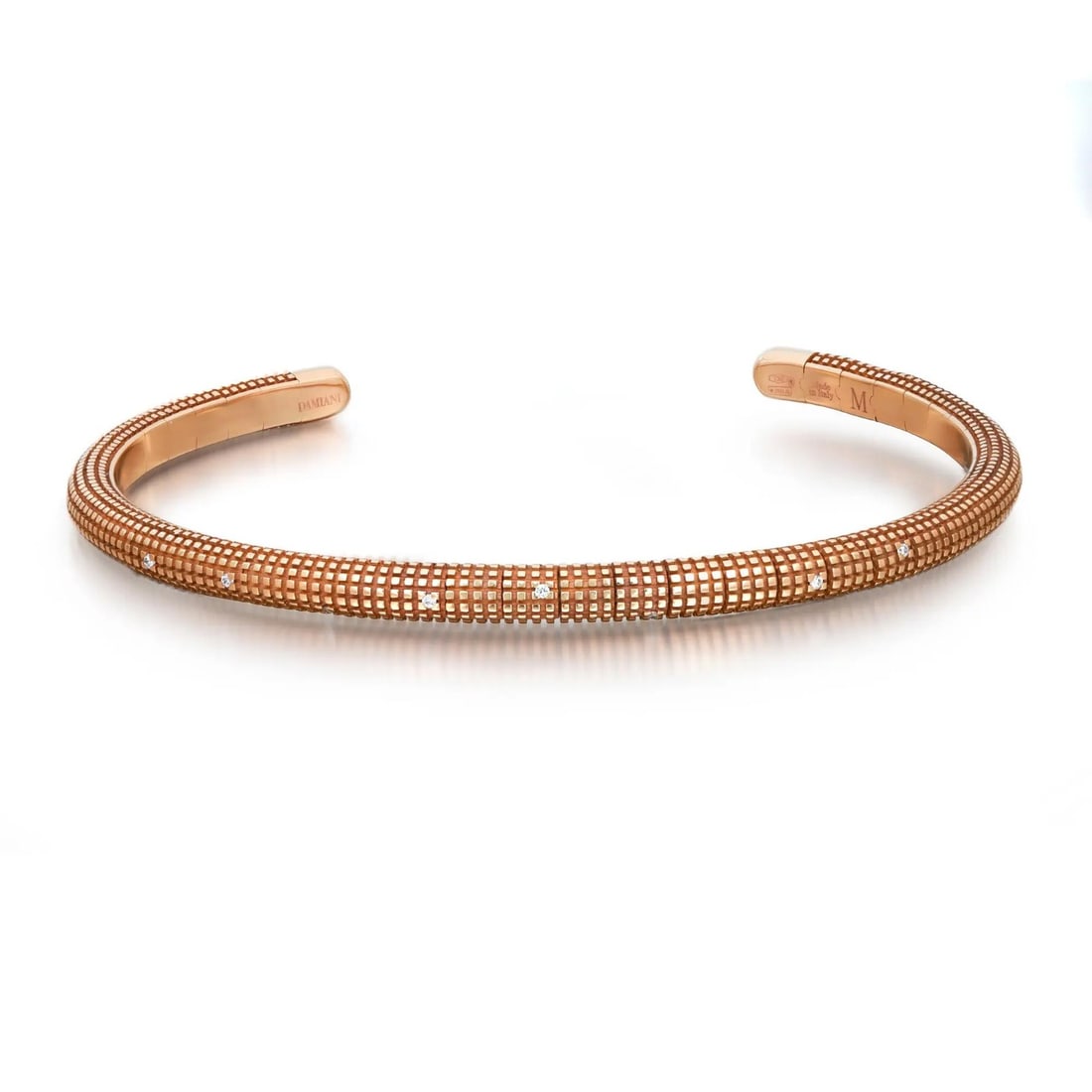Damiani 18K Rose Gold Diamond Bangle Bracelet 0.18ctw Adjustable: Damiani 18K Rose Gold Diamond Bangle Bracelet 0.18ctw Adjustable This exquisite Damiani bangle bracelet is crafted from 18K rose gold, showcasing a beautifully textured open design. Adorned with natur