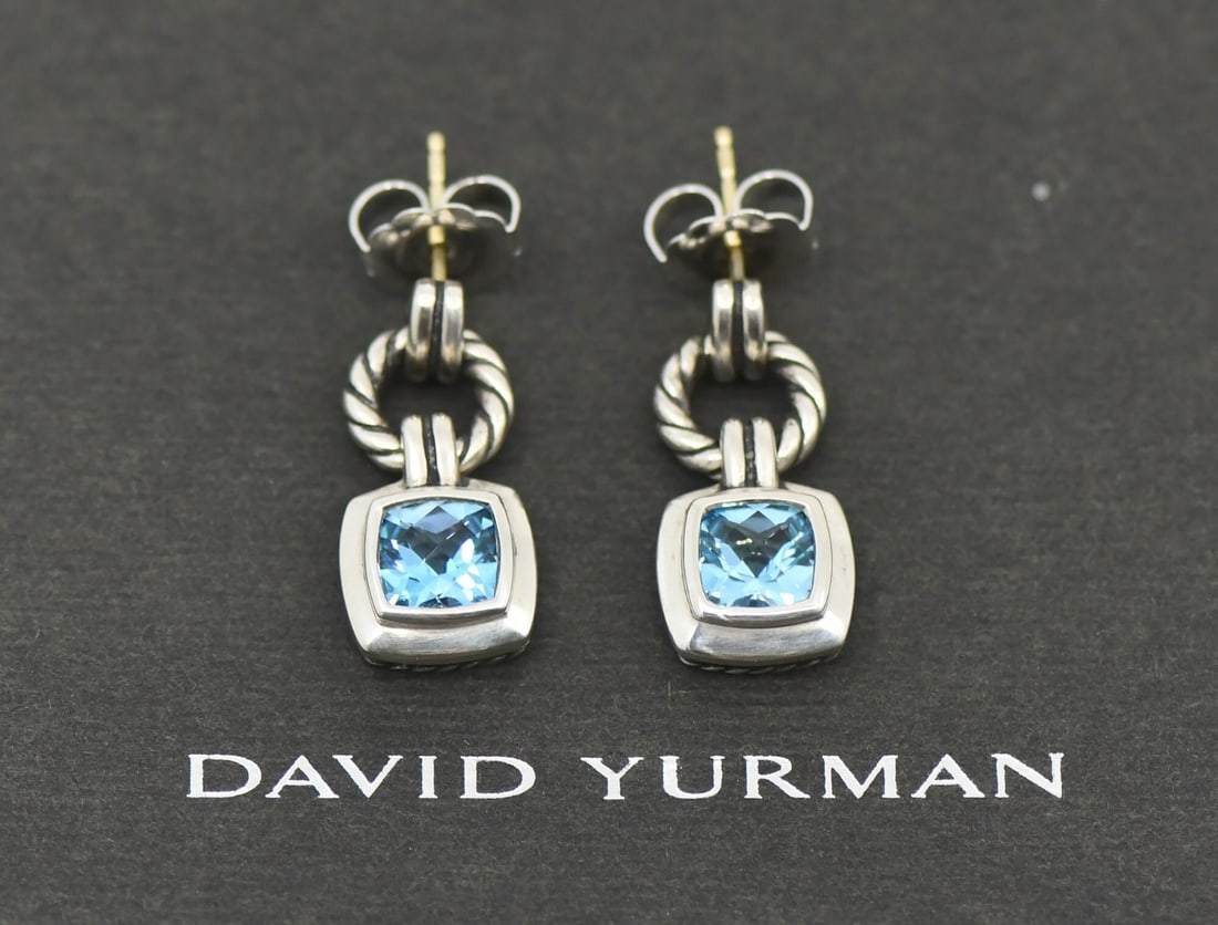 Albion Collection Sterling Silver Blue Topaz Earrings by David Yurman: Albion Collection Sterling Silver Blue Topaz Earrings by David Yurman These David Yurman Albion earrings feature striking blue topaz gemstones set in sterling silver. The chandelier-style earrings hav