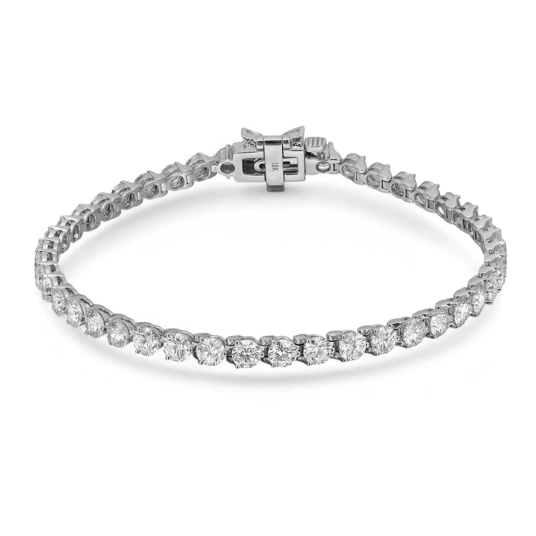 Rachel Koen 18K White Gold Lab Grown Diamond Tennis Bracelet 7.25Cttw: Rachel Koen 18K White Gold Lab Grown Diamond Tennis Bracelet 7.25Cttw This stunning tennis bracelet by Rachel Koen showcases a mesmerizing combination of round brilliant cut lab-grown diamonds and mar