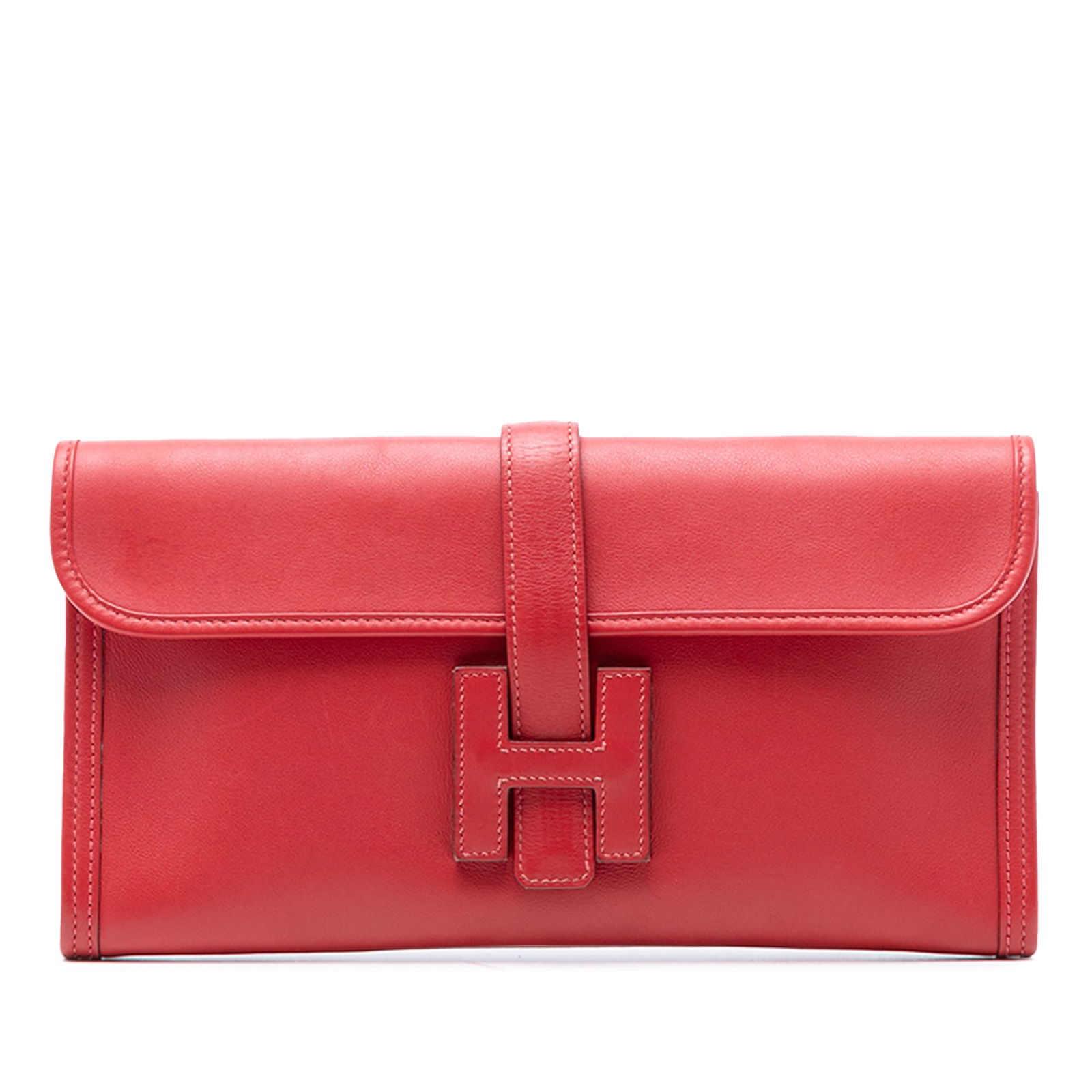 Hermes Jige Elan 29 Rouge Casaque Swift Leather Clutch: Hermes Jige Elan 29 Rouge Casaque Swift Leather Clutch This Hermes Jige Elan 29 clutch features a Rouge Casaque Swift leather body with a front flap and pull-through closure. The bag shows signs of we