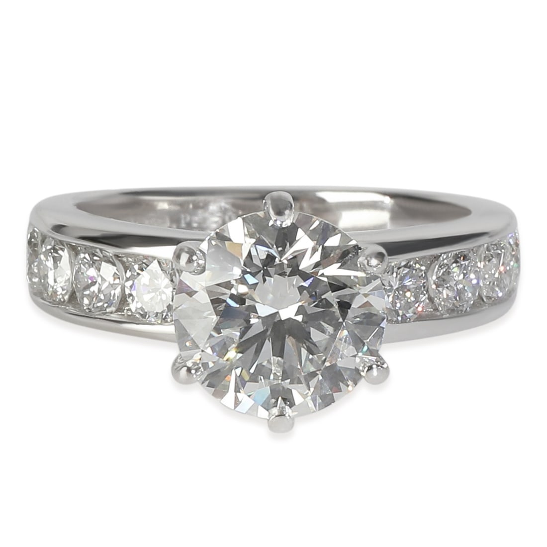 Tiffany & Co. 1.87 ct Round Diamond Engagement Ring Platinum Channel Set: Tiffany & Co. 1.87 ct Round Diamond Engagement Ring Platinum Channel Set This exquisite engagement ring from Tiffany & Co. features a stunning 1.87 ct round brilliant diamond as the centerpiece, enhan