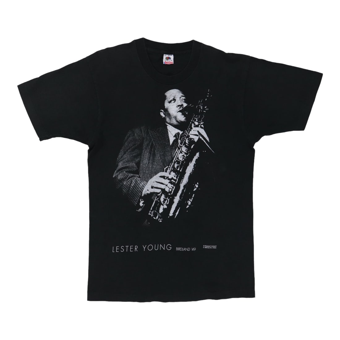 Vintage 1990 Lester Young Birdland 49 Black Cotton Shirt: Vintage 1990 Lester Young Birdland 49 Black Cotton Shirt Discover a true vintage gem with the 1990 Lester Young Birdland 49 Shirt. This authentic shirt features vibrant front and back graphics, captur