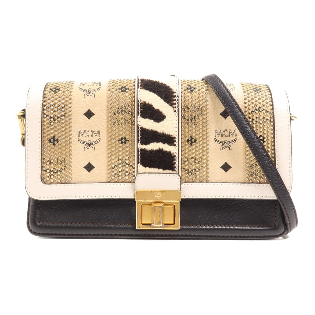 MCM Shoulder Bag Black Calfskin Horsehair GHW: MCM Shoulder Bag Black Calfskin Horsehair GHW This MCM Shoulder Bag features a luxurious combination of horsehair and calfskin leather in a striking black and brown-green color scheme. Designed for bo