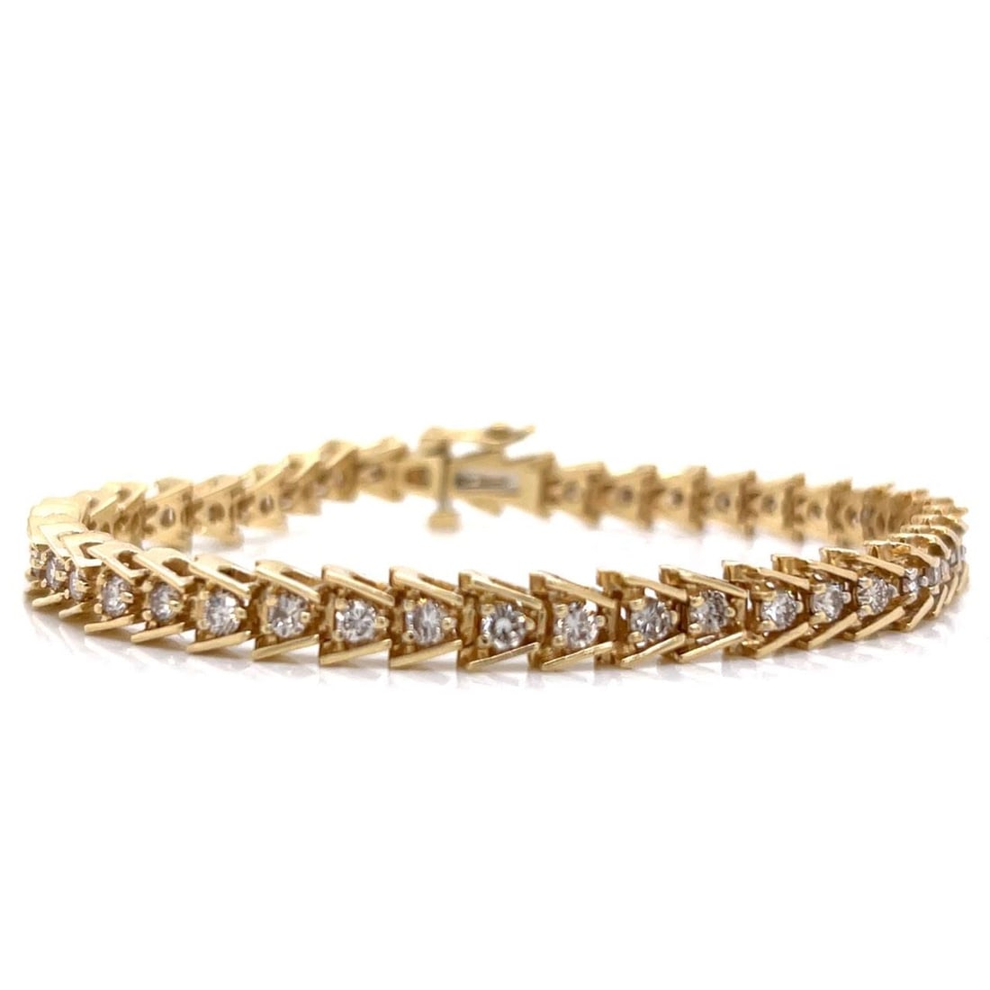 14K Yellow Gold 3.00 Ct Diamond Tennis Bracelet 43 Stones: 14K Yellow Gold 3.00 Ct Diamond Tennis Bracelet 43 Stones This exquisite 14K Yellow Gold Diamond Tennis Bracelet features a stunning total weight of approximately 3.00 carats. It is adorned with 43 sp