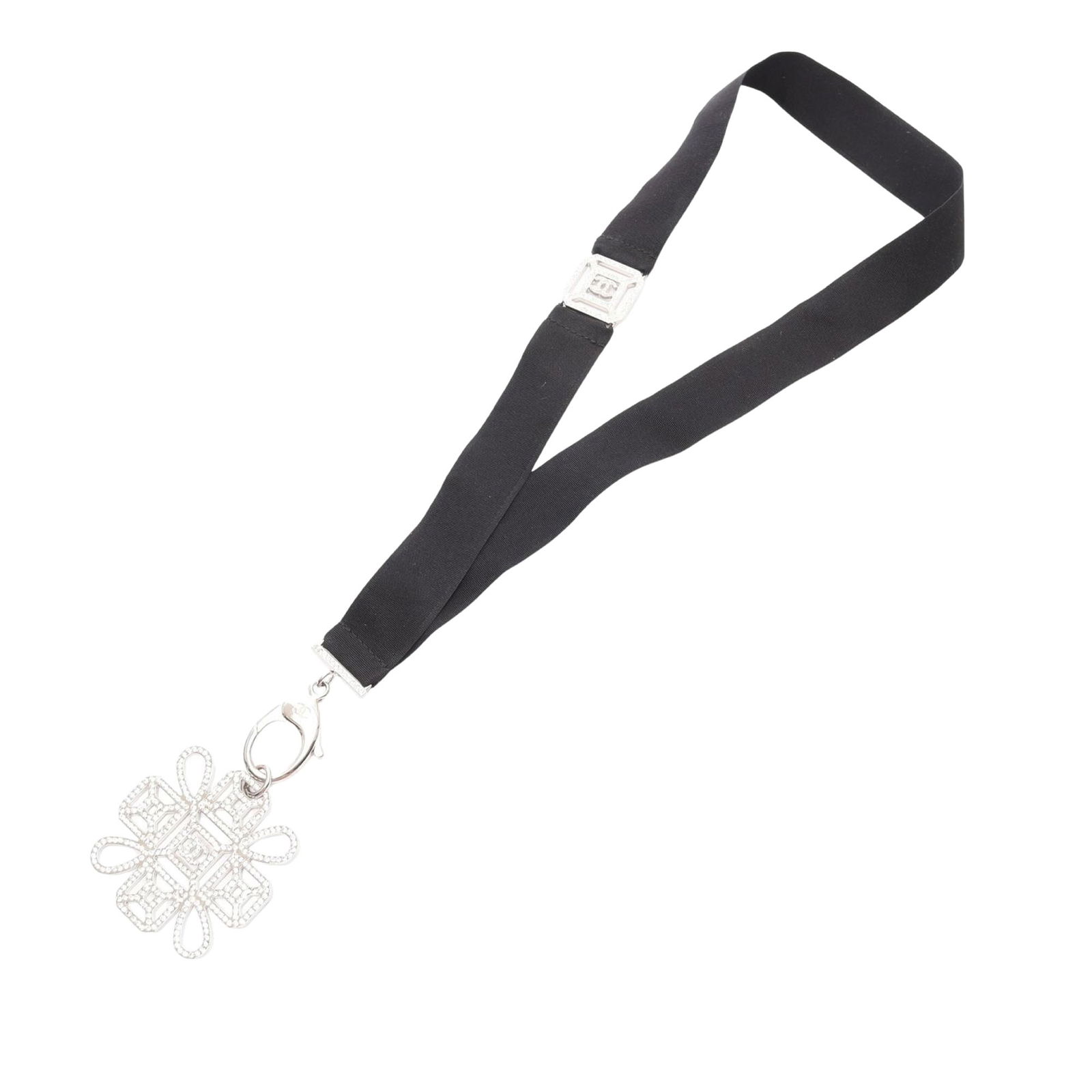 Chanel CC Cross Lanyard Necklace with Rhinestone Embellishments: Chanel CC Cross Lanyard Necklace with Rhinestone Embellishments This Chanel necklace features a grosgrain strap with stainless steel hardware and rhinestone embellishments, secured by a lobster clasp.