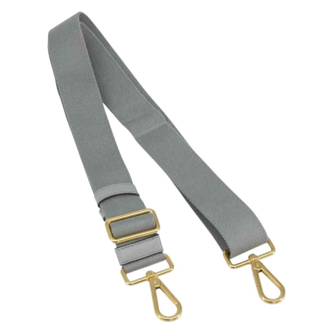 PRADA Adjustable Canvas Shoulder Strap Gray Gold Authentic AM9414: PRADA Adjustable Canvas Shoulder Strap Gray Gold Authentic AM9414 This authentic PRADA adjustable shoulder strap is crafted from durable canvas and features a stylish gray and gold color combination.