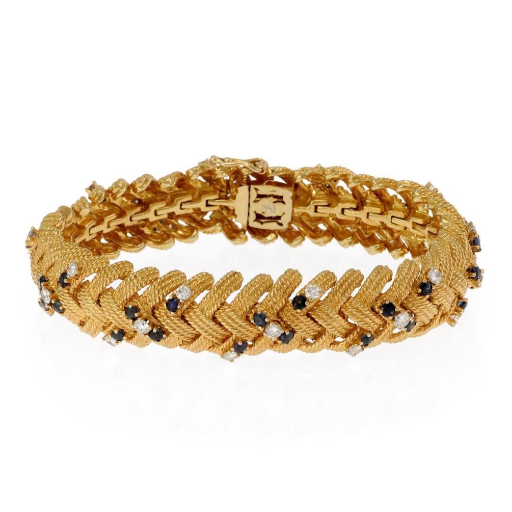 14k Yellow Gold Estate Bracelet with 1.65ct Diamonds and 1.70ct Sapphires: 14k Yellow Gold Estate Bracelet with 1.65ct Diamonds and 1.70ct Sapphires This exquisite estate bracelet is crafted from 14k yellow gold, showcasing a unique basket weave design complemented by a fine