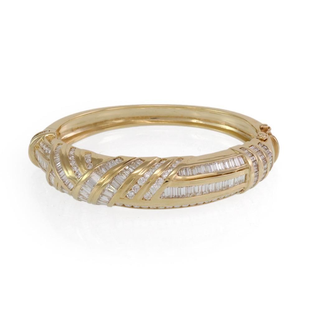14k Yellow Gold Diamond Bangle Bracelet 8-10 Carats Heavy Dome Design: 14k Yellow Gold Diamond Bangle Bracelet 8-10 Carats Heavy Dome Design This stunning diamond bangle bracelet features a heavy dome design, expertly crafted from 14k yellow gold with a high polished fin