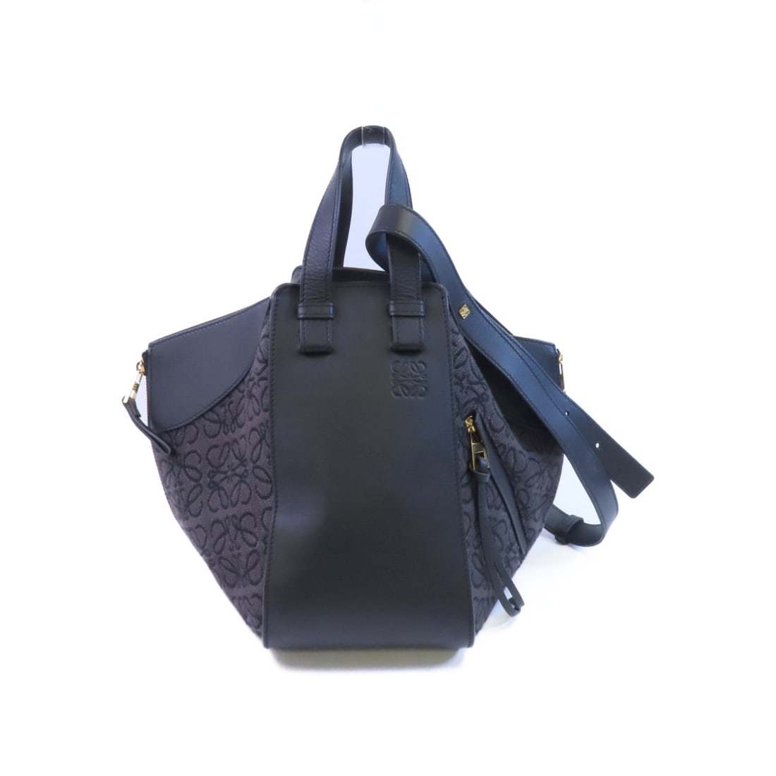 Loewe Hammock Medium Black Canvas and Calfskin Leather Shoulder Bag with Gold Hardware: Loewe Hammock Medium Black Canvas and Calfskin Leather Shoulder Bag with Gold Hardware This LOEWE Hammock Medium 2-way shoulder bag features a versatile design crafted from black canvas with calfskin