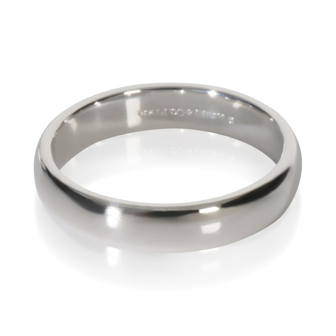 Platinum Tiffany Forever Band 4.5mm with Original Box Size 9.5: Platinum Tiffany Forever Band 4.5mm with Original Box Size 9.5 This Tiffany & Co. Platinum Tiffany Forever band features a classic 4.5mm width design crafted in platinum with a purity of 950. The unis