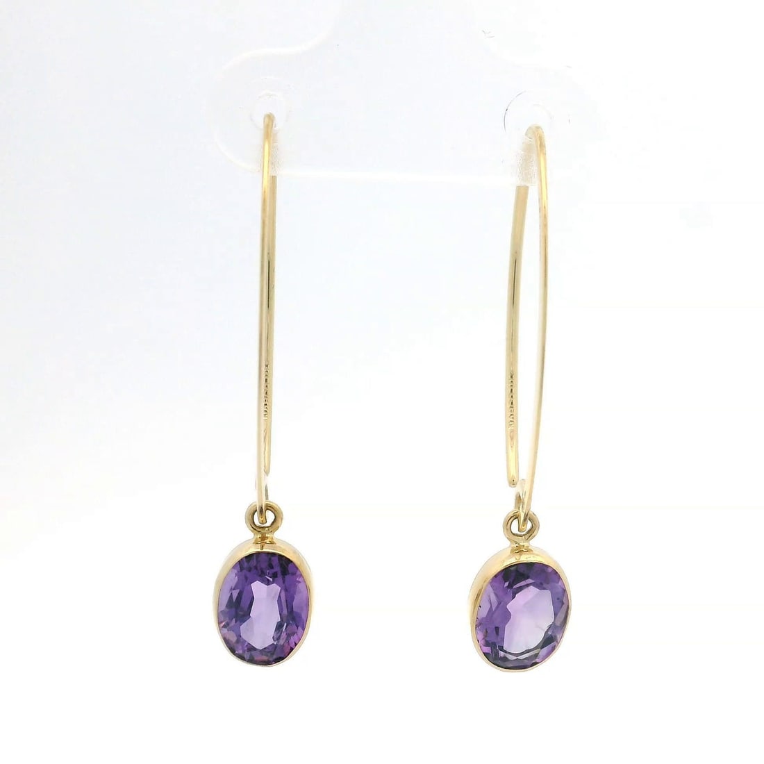 Estate Carla 14K Yellow Gold Amethyst Dangle Earrings: Estate Carla 14K Yellow Gold Amethyst Dangle Earrings Elevate your style with these stunning Estate Carla 14K Yellow Gold Bezel Set Amethyst Dangle Drop Earrings. Crafted from solid 14K yellow gold, t