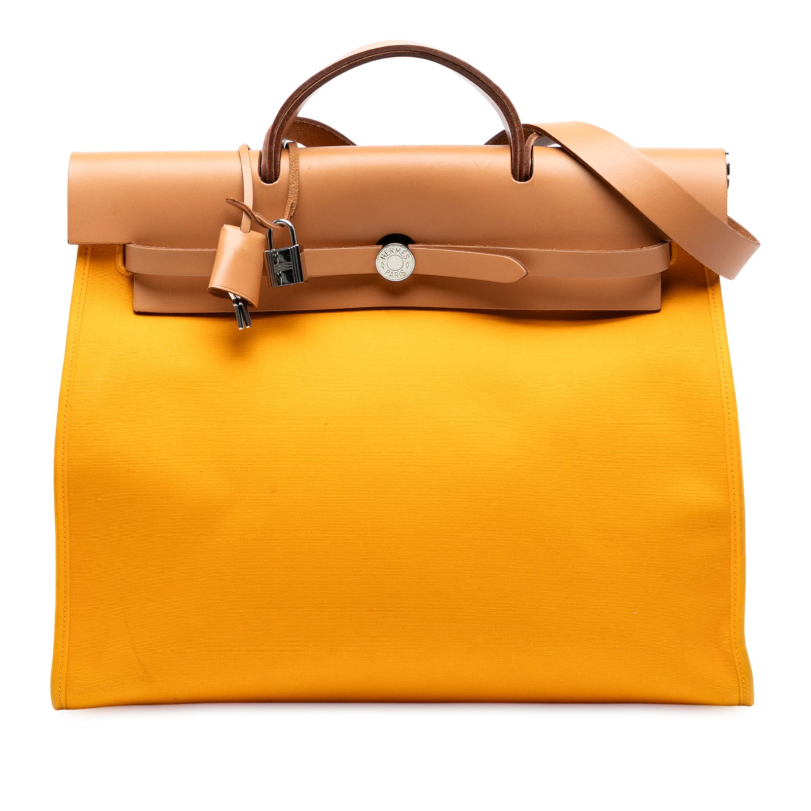 Hermes Toile Herbag Zip 39 Yellow Canvas Shoulder Bag: Hermes Toile Herbag Zip 39 Yellow Canvas Shoulder Bag Introducing the Hermes Toile Herbag Zip 39, a stylish and functional bag crafted from durable canvas. This bag features a flat leather top handle