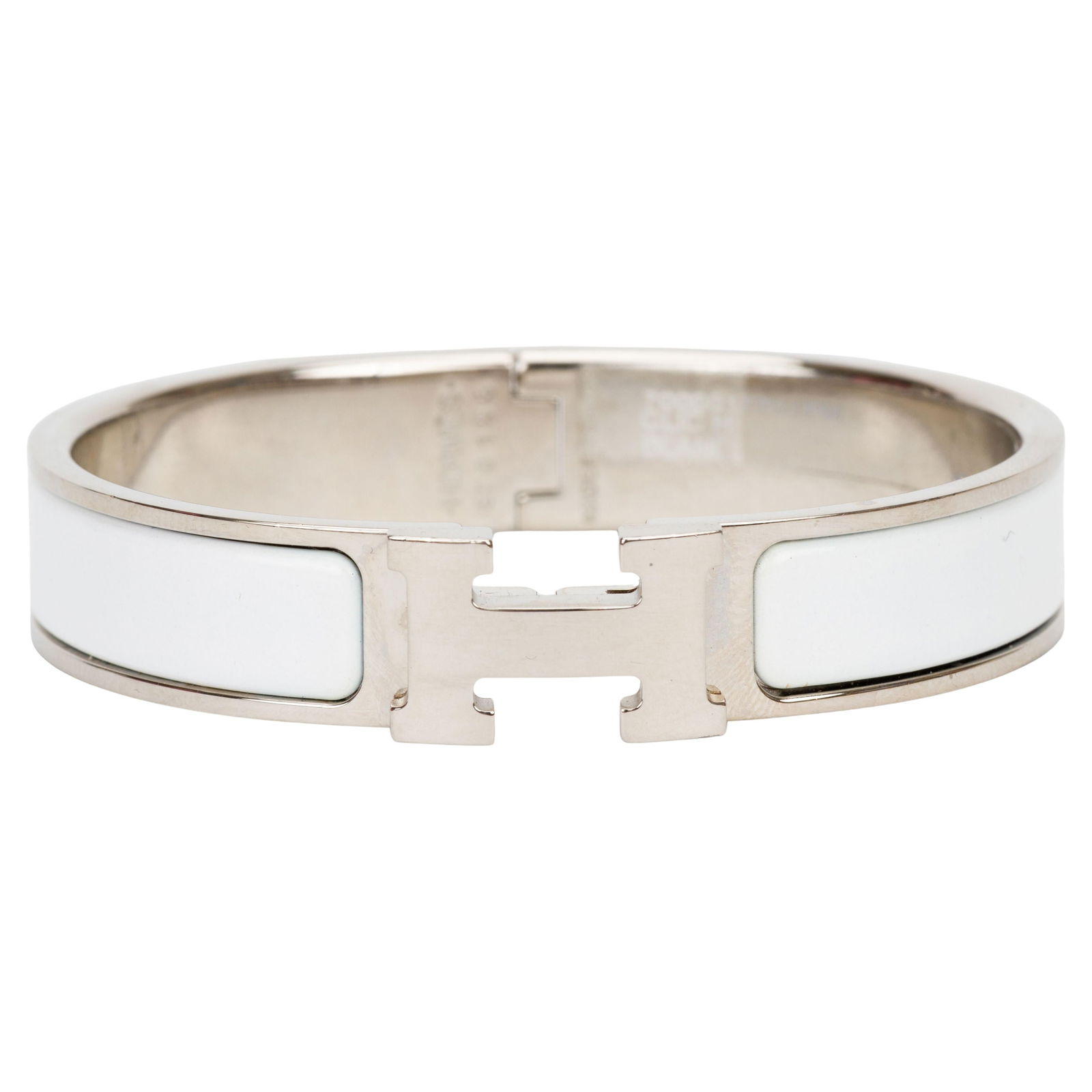 Hermes Clic H White Enamel Bracelet 2022 France: Hermes Clic H White Enamel Bracelet 2022 France Introducing the Hermes White Palladium Clic "H" Bracelet, a stunning piece crafted from enamel. This narrow bracelet features a sleek white finish paire