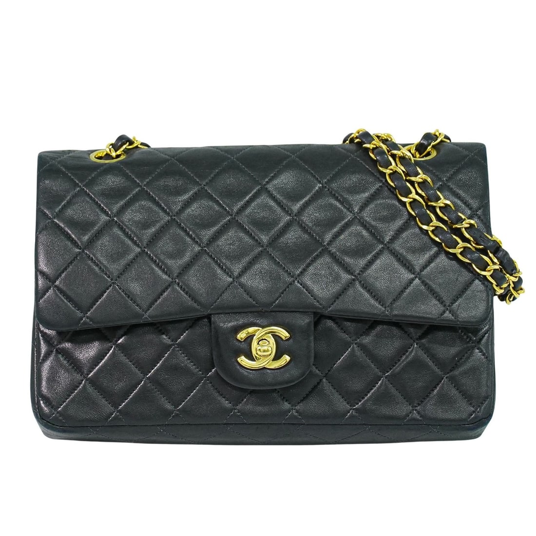 Chanel Matelasse Black Double Flap Vintage Shoulder Bag: Chanel Matelasse Black Double Flap Vintage Shoulder Bag This pre-owned Chanel CC Matelasse shoulder bag features a classic double flap design in black. It is crafted for women and remains a stylish ac
