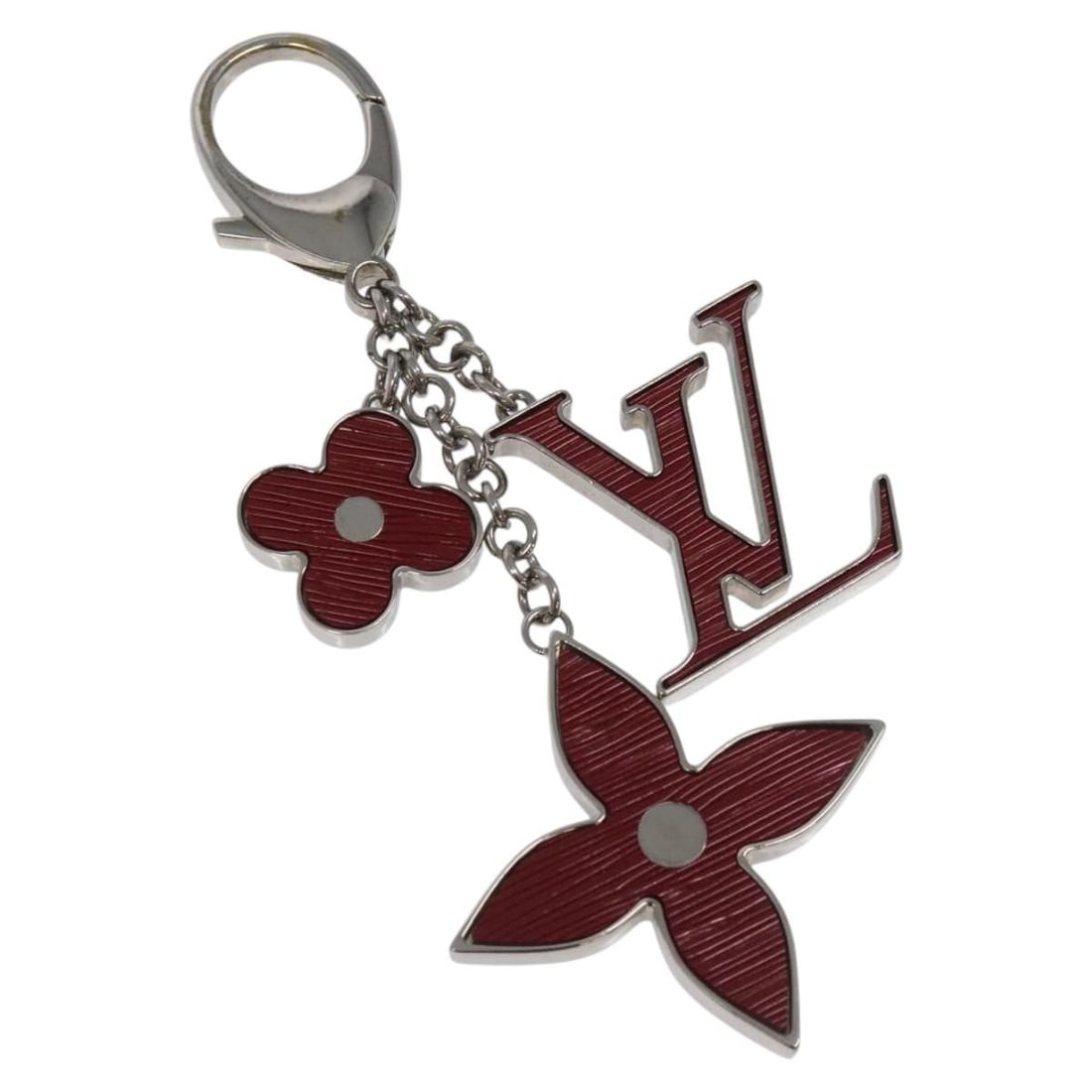 LOUIS VUITTON M65224 Red Metal Bijusac Fleur Deux Charm: LOUIS VUITTON M65224 Red Metal Bijusac Fleur Deux Charm This stunning Louis Vuitton Epi Bijusac Fleur Deux Charm is crafted from high-quality metal with a vibrant red finish. Measuring approximately 4