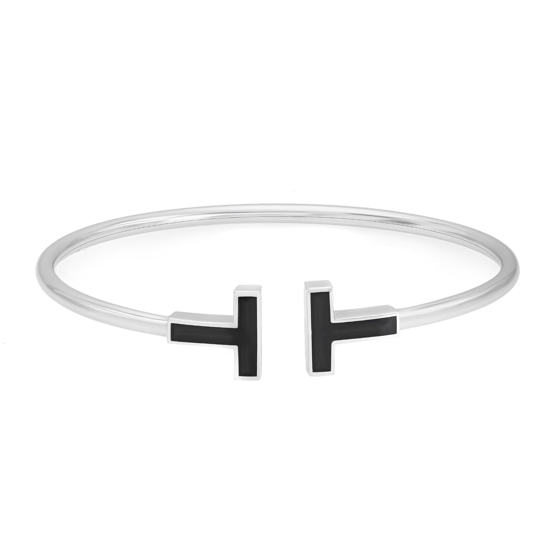 Tiffany & Co. T Black Onyx Cuff Bracelet 18K White Gold Stackable: Tiffany & Co. T Black Onyx Cuff Bracelet 18K White Gold Stackable This exquisite Tiffany & Co. T Black Onyx Wire Bracelet combines modern elegance with bold design. Crafted from 18K white gold, this c