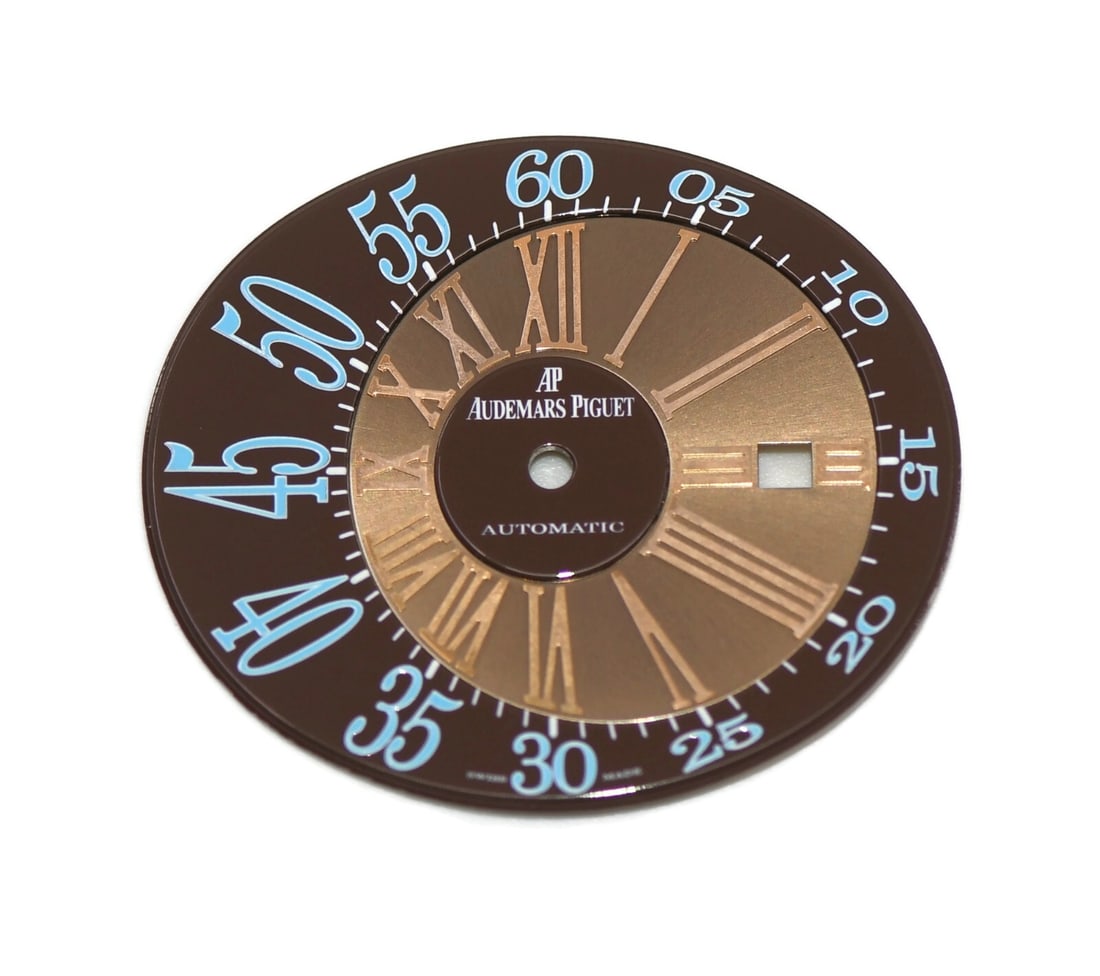 Audemars Piguet Millenary Authentic Brown Dial 36mm x 31mm: Audemars Piguet Millenary Authentic Brown Dial 36mm x 31mm This Audemars Piguet Millenary features a striking brown dial, enhancing the elegance of its unique oval case design. Measuring 36mm by 31mm,