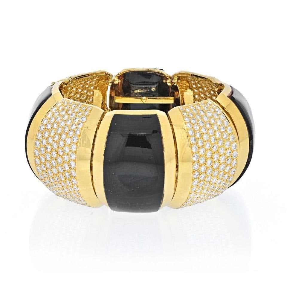 Hammerman Brothers 18K Gold 41 Carat Black Agate Diamond Bangle Bracelet: Hammerman Brothers 18K Gold 41 Carat Black Agate Diamond Bangle Bracelet This stunning vintage bangle bracelet from Hammerman Brothers features a luxurious design crafted in 18K yellow gold. The brace