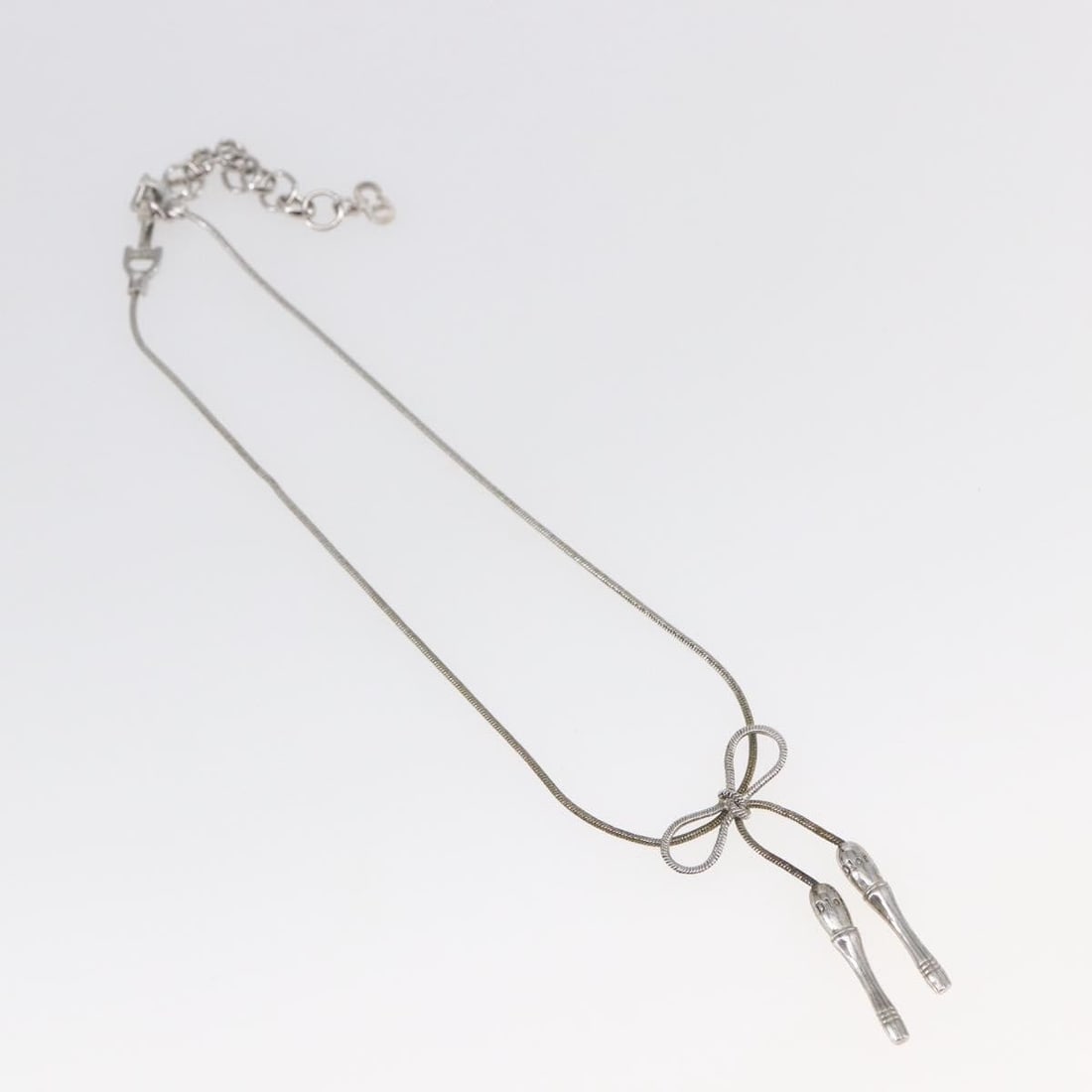 Christian Dior Silver Necklace with Bow and CD Pendant (1 of 2)