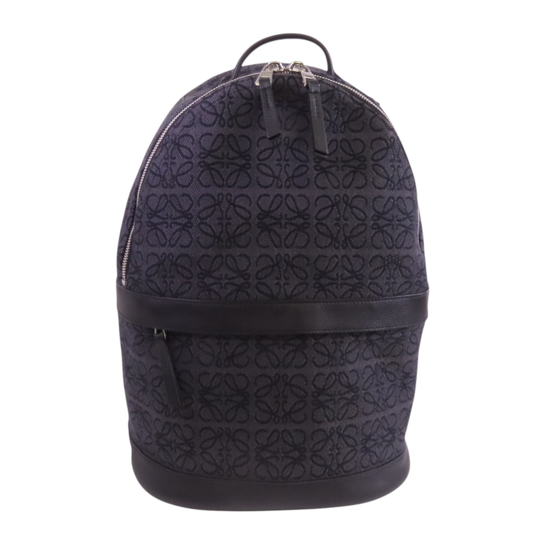 LOEWE Black Canvas Calfskin Leather Rucksack Backpack: LOEWE Black Canvas Calfskin Leather Rucksack Backpack This LOEWE Rucksack Backpack combines stylish functionality with premium materials. Crafted from durable black canvas with calfskin leather accent