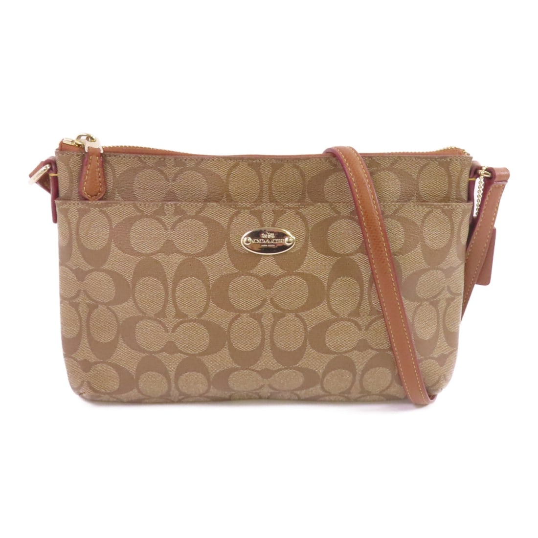 Coach FS52657 Brown Coated Canvas Shoulder Bag with Gold Hardware: Coach FS52657 Brown Coated Canvas Shoulder Bag with Gold Hardware This COACH shoulder bag is crafted from durable PVC coated canvas in brown. Designed for versatility, it can be worn as a shoulder bag
