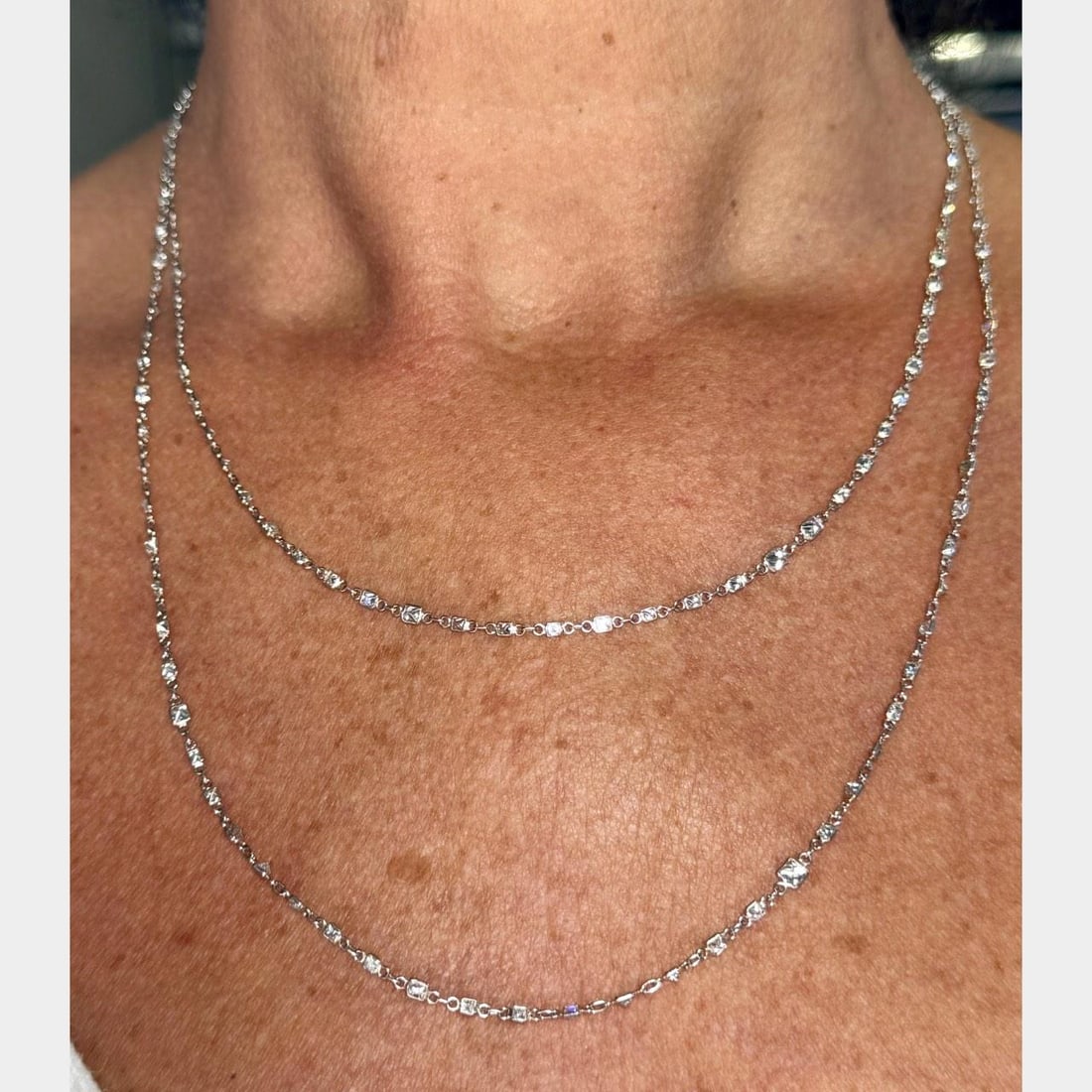 Platinum 40" 10.90 Ct Diamond by the Yard Necklace: Platinum 40" 10.90 Ct Diamond by the Yard Necklace This exquisite Platinum Diamond by the Yard Necklace features a stunning arrangement of 156 princess-cut diamonds, totaling approximately 10.90 carat