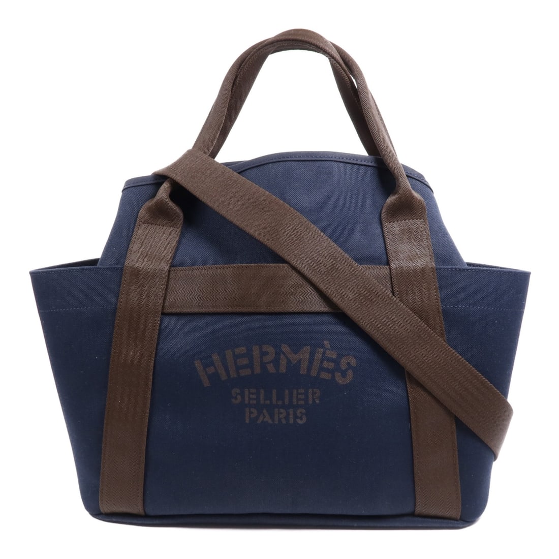 HERMES Sac De Pansage 2 Way Shoulder Bag Canvas Bleu Indigo Orange: HERMES Sac De Pansage 2 Way Shoulder Bag Canvas Bleu Indigo Orange Introducing the HERMES Sac De Pansage Groom 2 Way Shoulder Bag, a stylish and versatile accessory crafted from durable canvas in a st