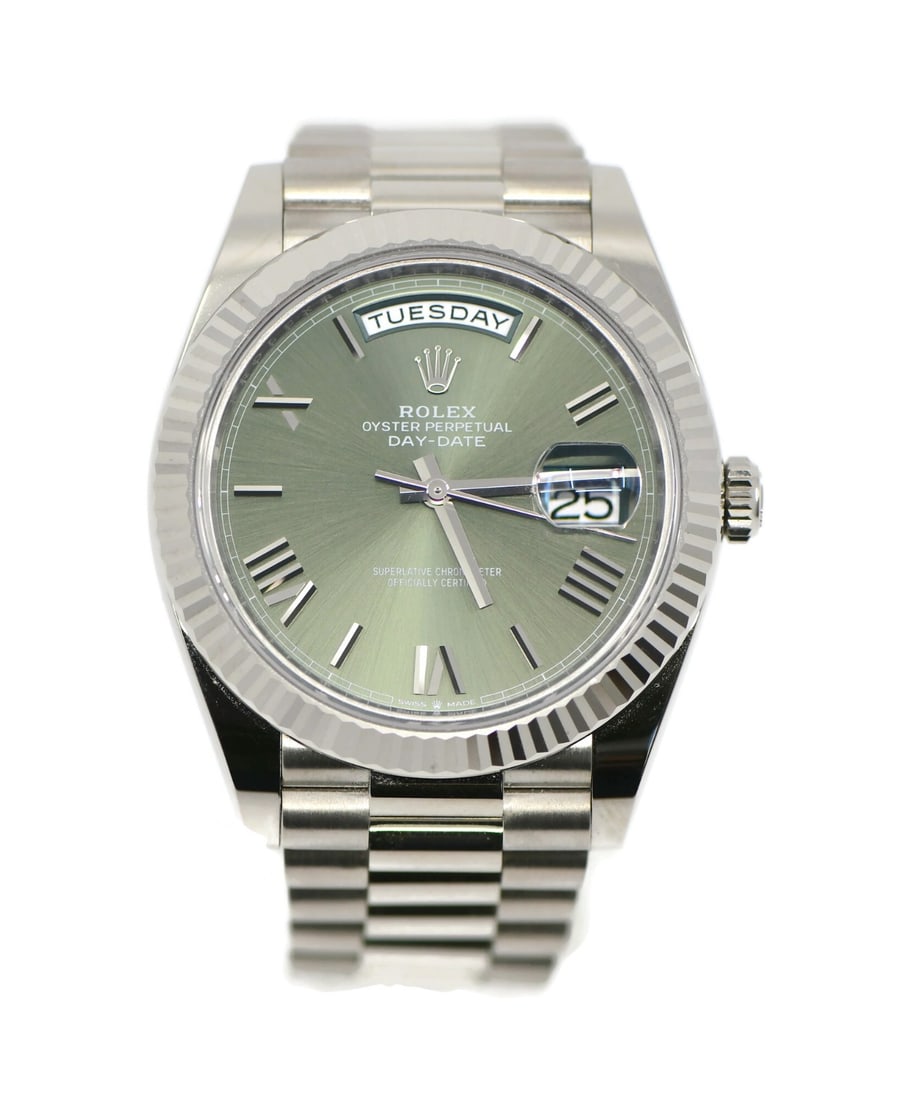 Rolex Day-Date 40 18K White Gold Olive Dial Watch 228239: Rolex Day-Date 40 18K White Gold Olive Dial Watch 228239 Discover the elegance of the Rolex Day-Date 40, a stunning wristwatch crafted in 18K white gold. This exquisite timepiece features a vibrant gr