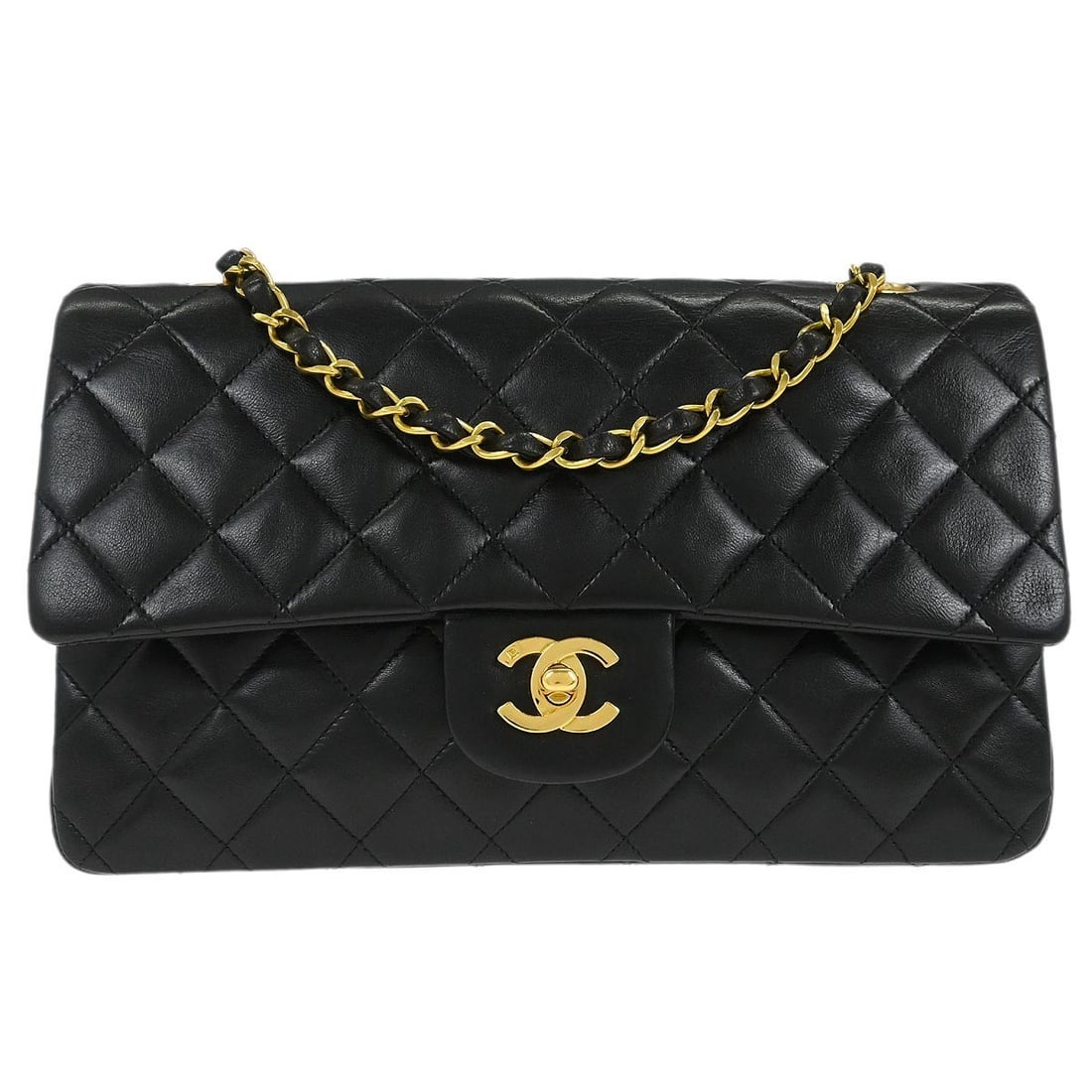 Medium Classic Double Flap Black Lambskin Shoulder Bag by Chanel: Medium Classic Double Flap Black Lambskin Shoulder Bag by Chanel This is a black lambskin medium Classic Double Flap shoulder bag featuring a turn lock closure and a shoulder strap. The bag is in very