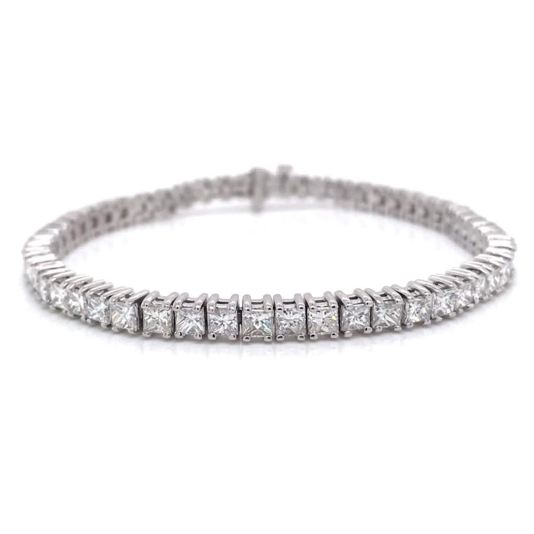 Elegant 8.50 Ct Diamond Tennis Bracelet in 14K White Gold: Elegant 8.50 Ct Diamond Tennis Bracelet in 14K White Gold Elevate your jewelry collection with this stunning 8.50 Ct Diamond Tennis Bracelet. This exquisite piece is adorned with 55 Princess Cut Diamo