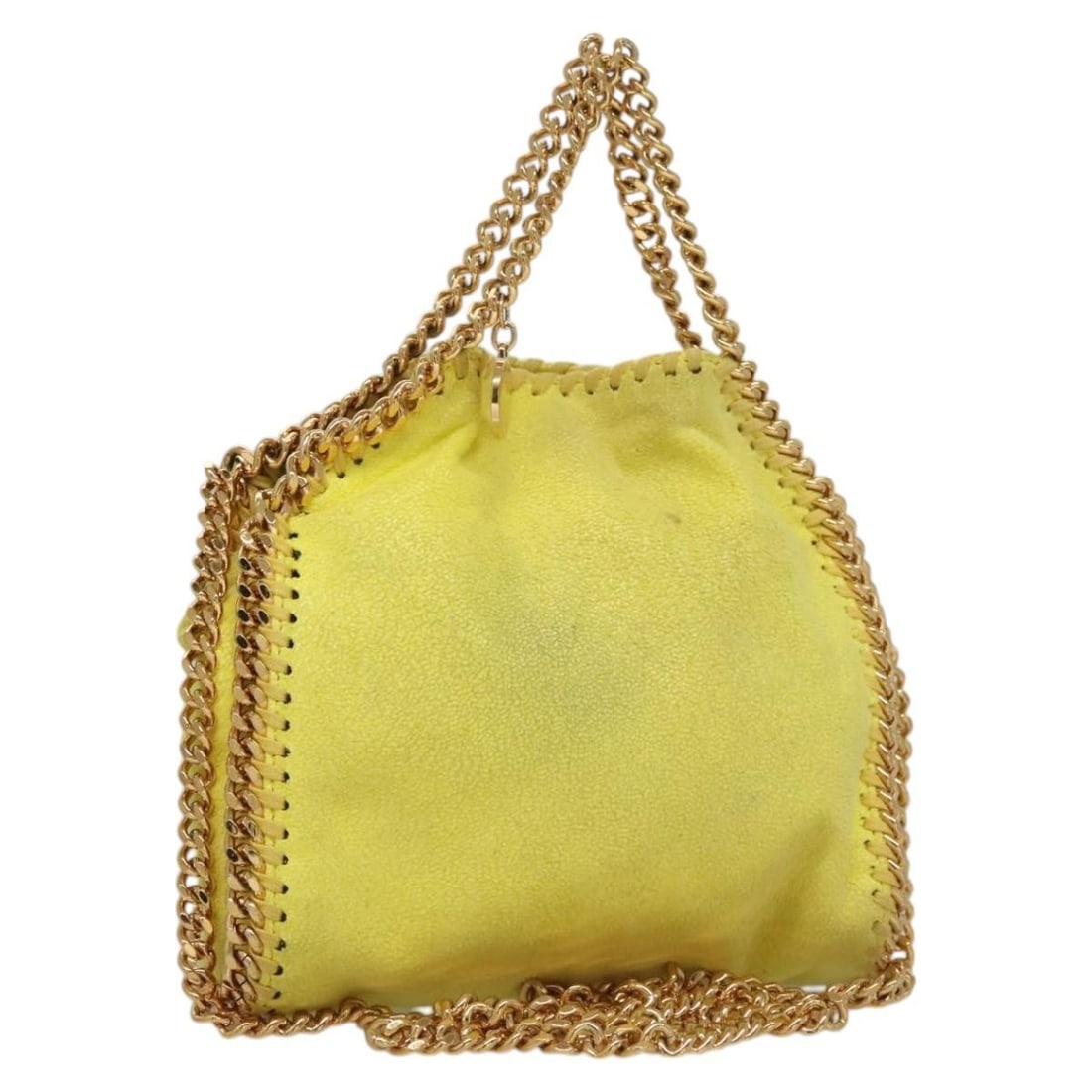 Yellow Falabella Fold Over Crossbody by Stella McCartney: Yellow Falabella Fold Over Crossbody by Stella McCartney This is a Stella McCartney Falabella Fold Over Crossbody Bag in yellow, designed for women. The bag shows some signs of use, including loss of