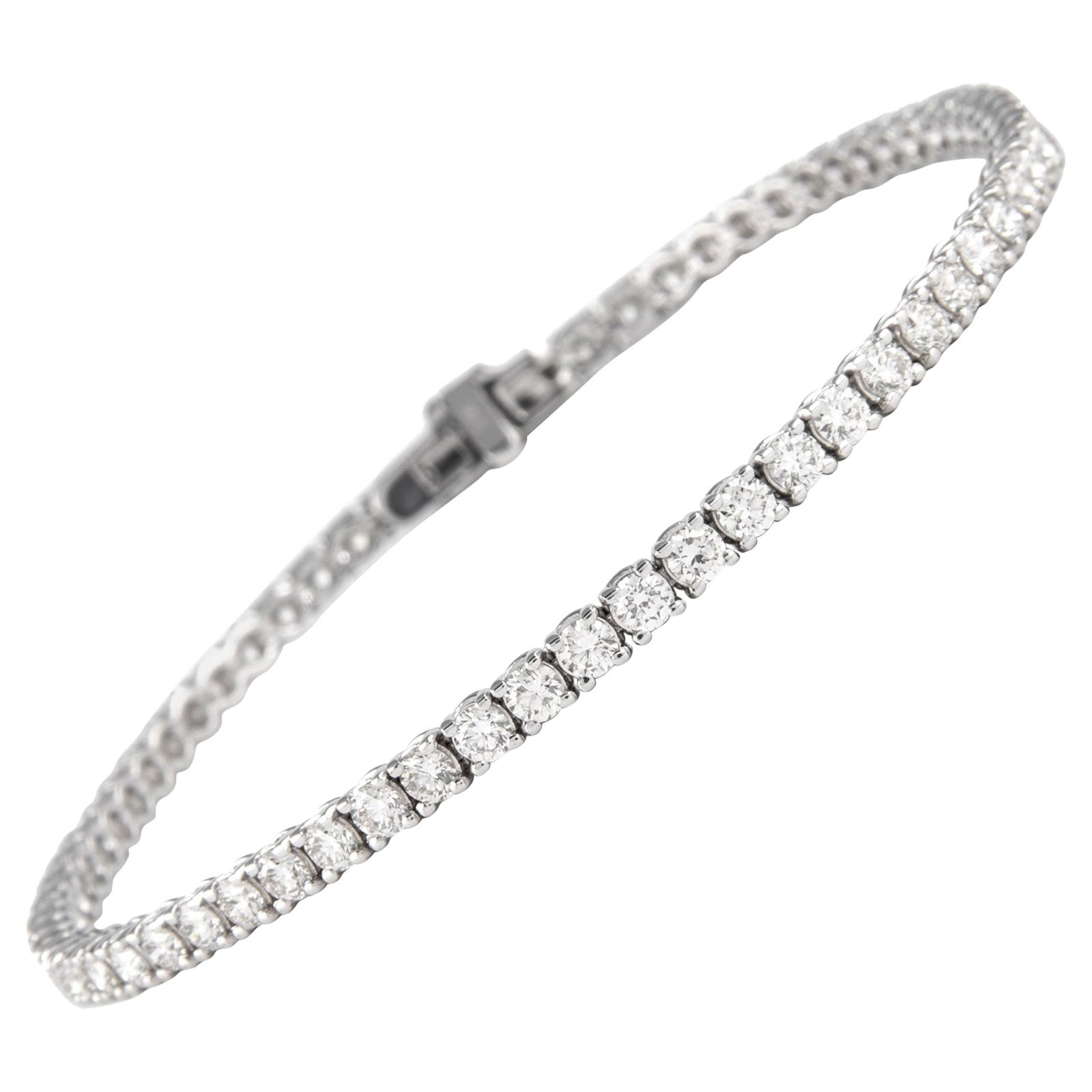 3.98ct Diamond Tennis Bracelet in 14k White Gold: 3.98ct Diamond Tennis Bracelet in 14k White Gold This exquisite diamond tennis bracelet features a stunning total weight of 3.98 carats, showcasing 61 round brilliant diamonds with approximately F/G c
