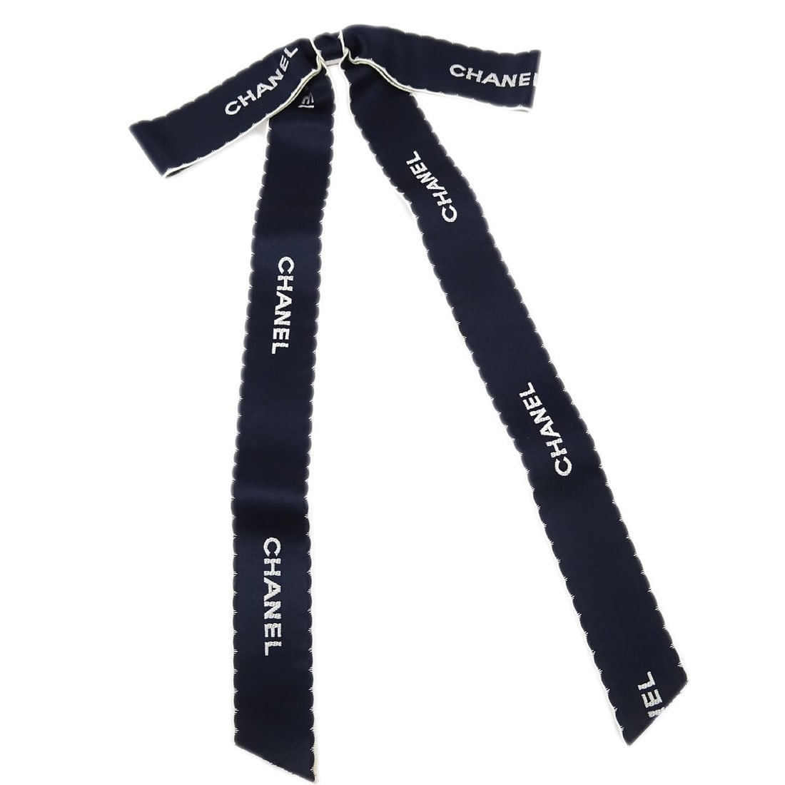 Chanel Navy Satin Bow Brooch Pin Gold-Plated: Chanel Navy Satin Bow Brooch Pin Gold-Plated Enhance your accessory collection with this elegant Chanel Bow Brooch Pin in a sophisticated navy hue. Crafted from luxurious satin, this brooch features a