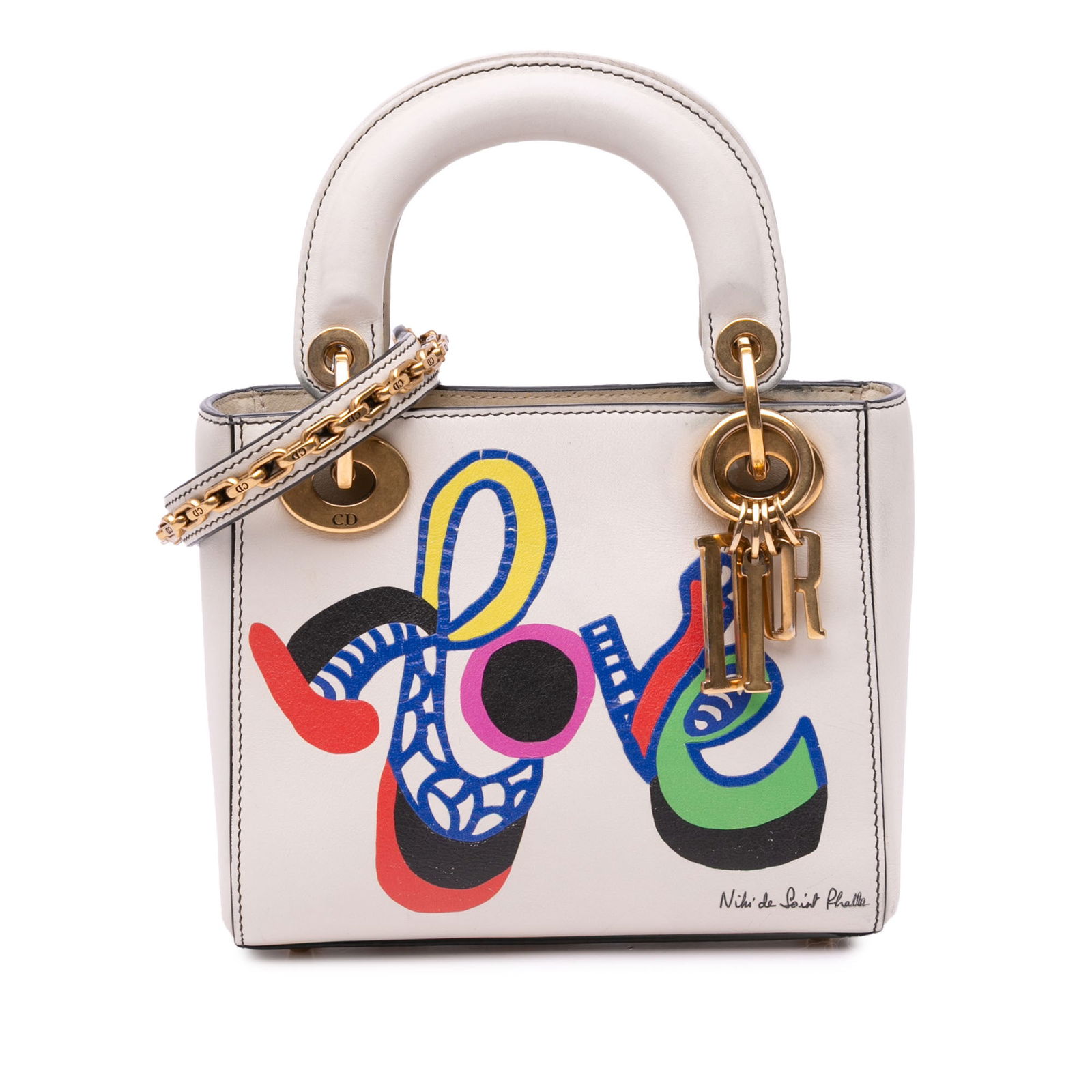 Dior Niki De Saint Phalle Mini Love Calfskin Satchel Bag White: Dior Niki De Saint Phalle Mini Love Calfskin Satchel Bag White Introducing the Niki De Saint Phalle Mini Calfskin Love Lady Dior, a unique and stylish satchel crafted from printed leather. This exquis