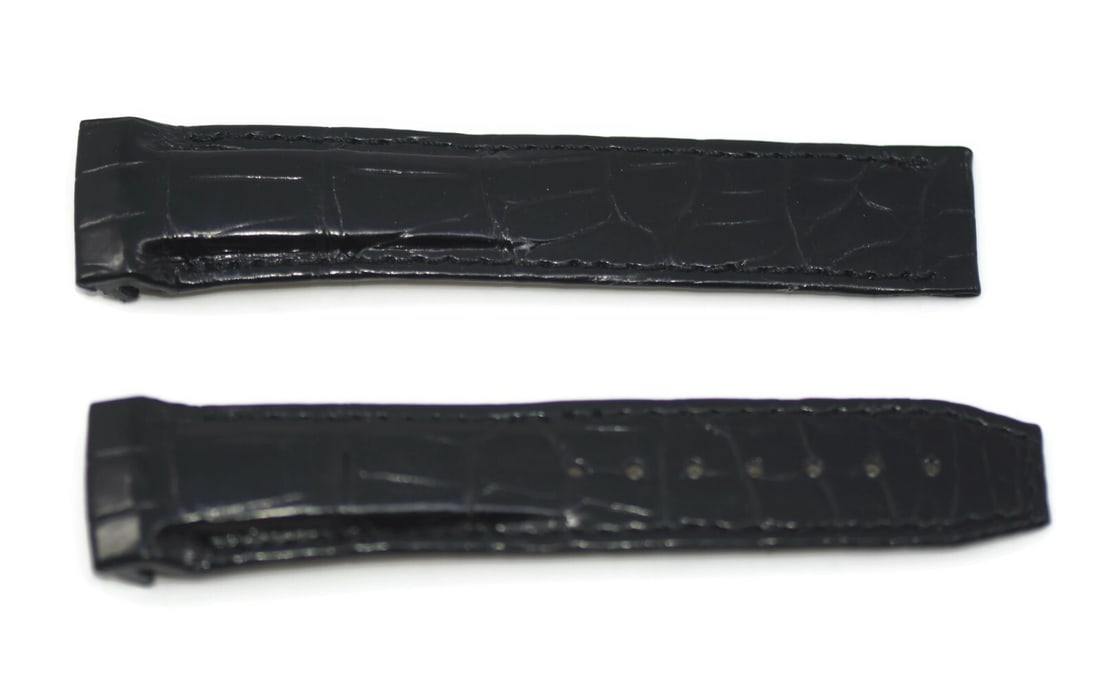 Authentic Omega Black Leather Watch Strap 20mm: Authentic Omega Black Leather Watch Strap 20mm This Omega Black Leather Strap is a high-quality wristwatch band that combines elegance with durability. Crafted from genuine leather, it features a slee