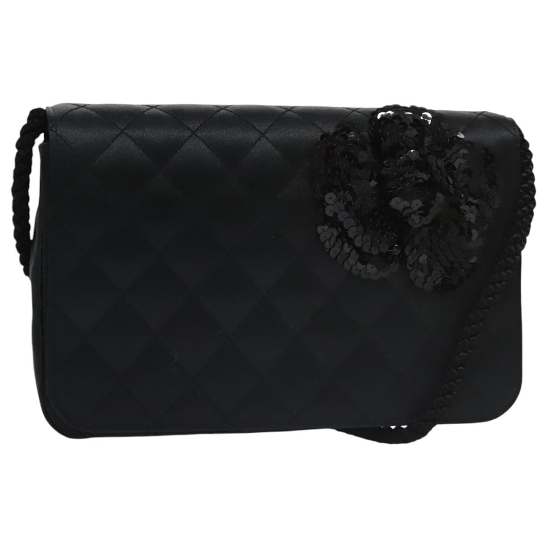 Black Chanel Wallet on Chain with Camellia Charms: Black Chanel Wallet on Chain with Camellia Charms This Chanel Camellia Charms Wallet on Chain in black features a compact and elegant design with camellia charms. The exterior displays minor rubbing a
