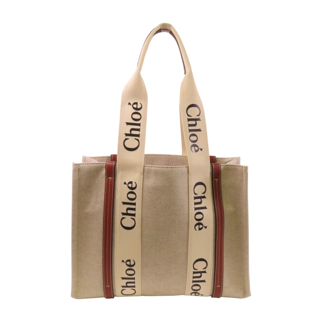 Chloe Woody Medium Tote Bag Beige Canvas France: Chloe Woody Medium Tote Bag Beige Canvas France The Chloe Woody Tote Medium Shoulder Bag is a stylish and functional accessory crafted from durable canvas in an elegant beige and brown color combinati