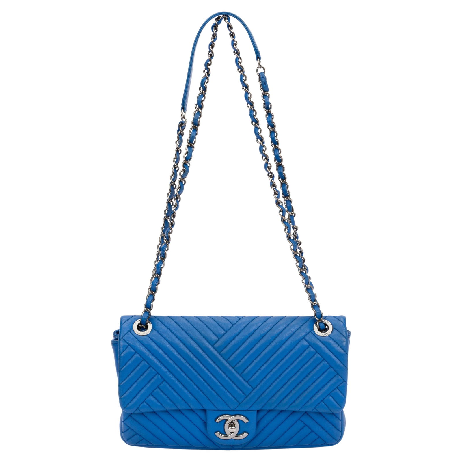 Chanel Blue Izmir Quilted Leather Flap Bag with Silver Hardware: Chanel Blue Izmir Quilted Leather Flap Bag with Silver Hardware This exquisite Chanel Blue Izmir Single Quilted Flap bag is a timeless piece from the 21st Century collection. Crafted in Italy from hig