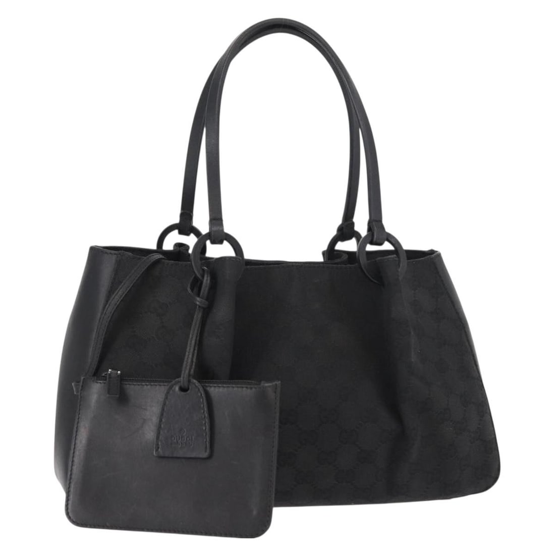 Vintage GG Canvas Bag by Gucci in Black: Vintage GG Canvas Bag by Gucci in Black This pre-owned Gucci GG canvas handbag features a classic black design and is suitable for female use. The bag is in good condition with visible signs of wear,