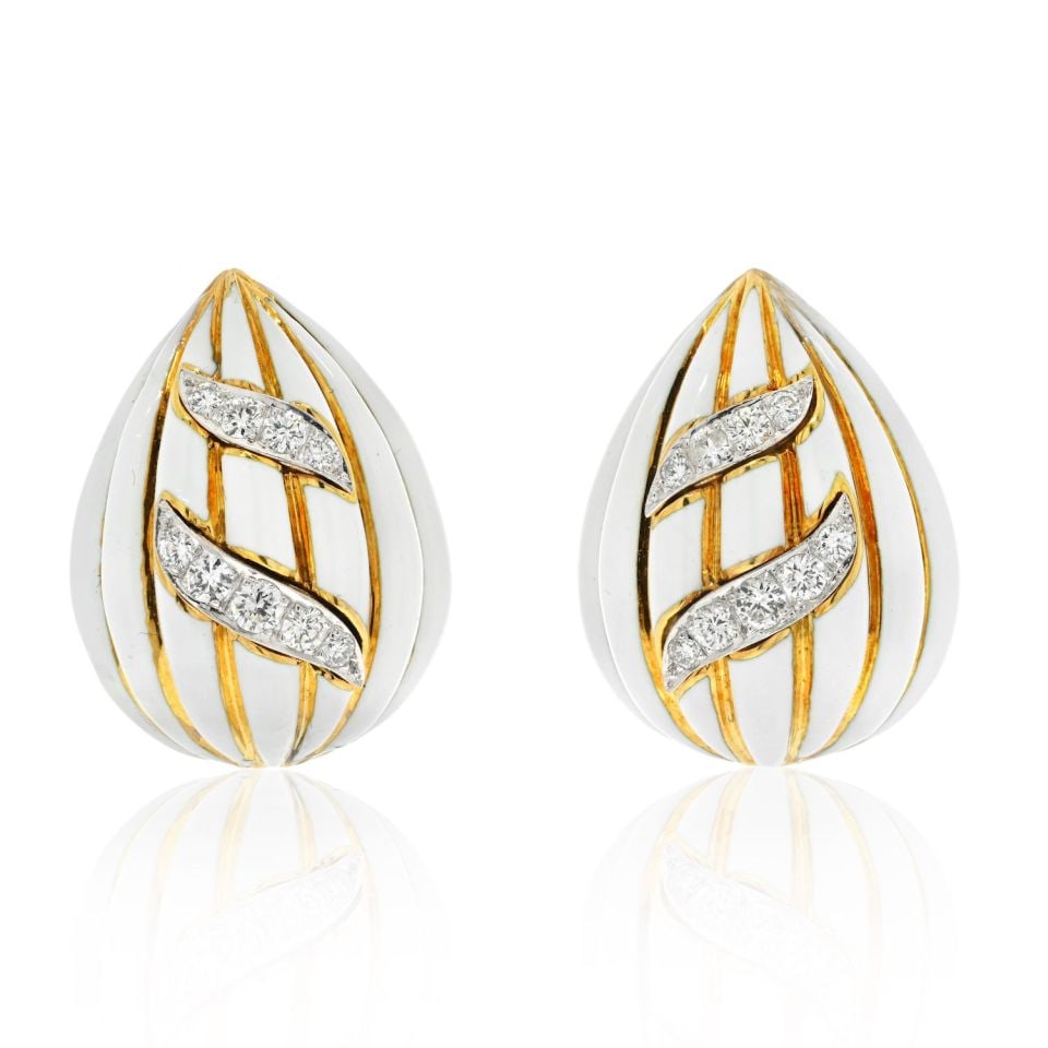 David Webb Fluted Almonds Earrings in White Enamel and Diamonds: David Webb Fluted Almonds Earrings in White Enamel and Diamonds Exquisite David Webb Fluted Almonds Earrings featuring a stunning design in white enamel and diamonds. These earrings showcase a unique