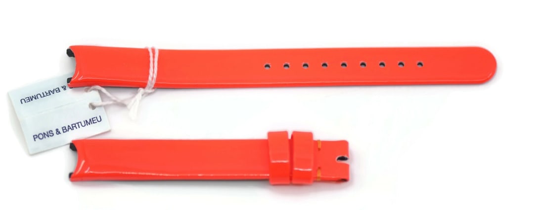 Authentic Dior Orange Wristwatch Band 11mm Width: Authentic Dior Orange Wristwatch Band 11mm Width Enhance your timepiece with this authentic Dior orange wristwatch band. Crafted for style and durability, this band features a vibrant orange color tha