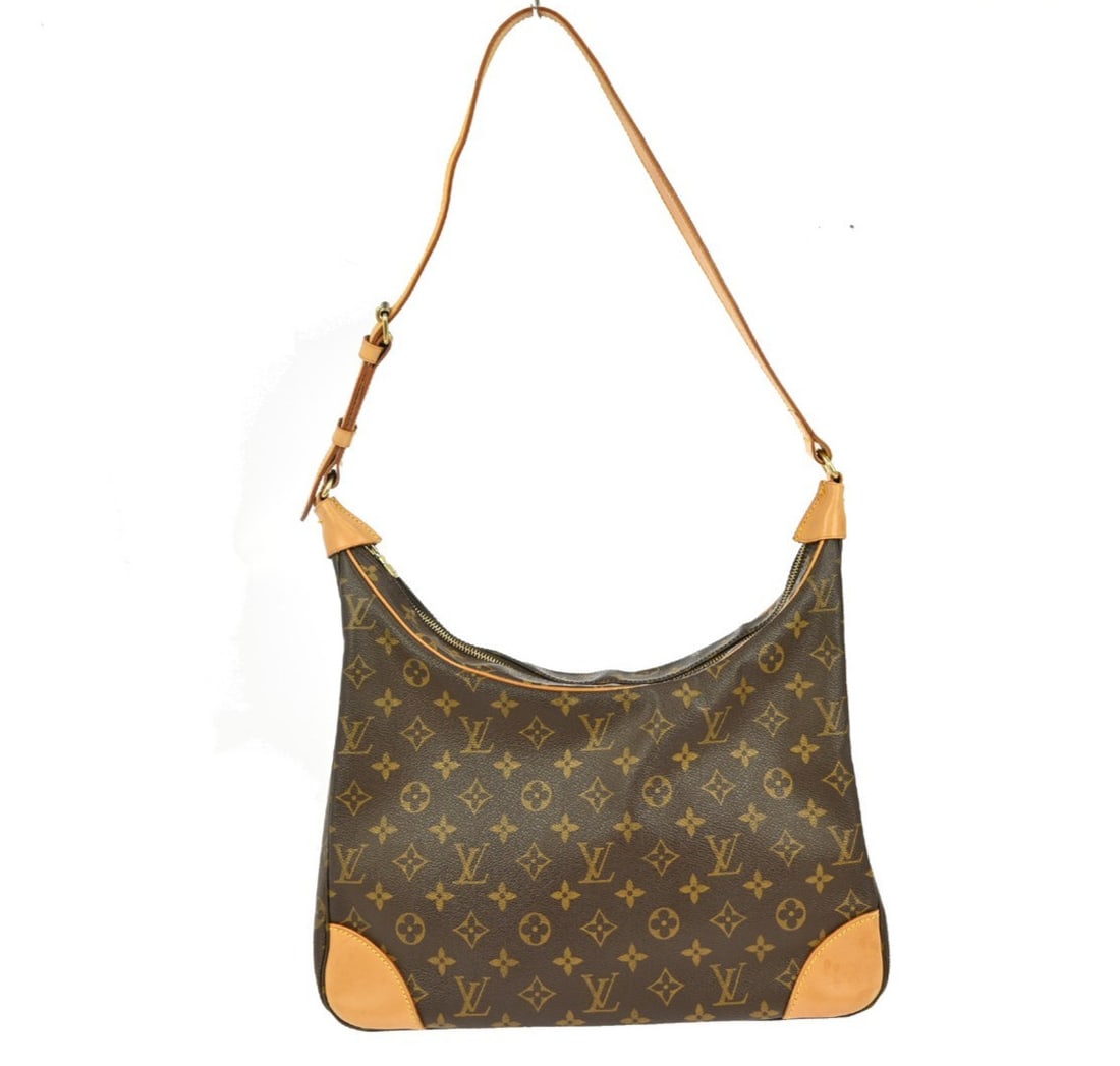 Louis Vuitton Monogram Boulogne 35 Brown Leather Shoulder Bag: Louis Vuitton Monogram Boulogne 35 Brown Leather Shoulder Bag This Louis Vuitton Monogram Boulogne 35 shoulder bag is a timeless piece, perfect for casual occasions. Crafted from high-quality leather,