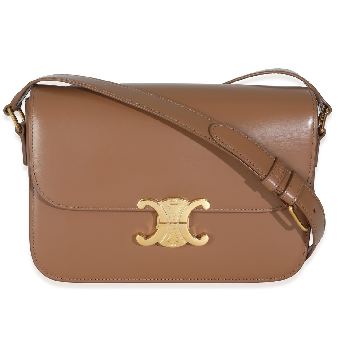 Celine Bronze Calfskin Teen Triomphe Shoulder Bag: Celine Bronze Calfskin Teen Triomphe Shoulder Bag Introducing the Celine Bronze Calfskin Teen Triomphe Bag, a stylish shoulder bag crafted from luxurious leather. This exquisite handbag features a sop