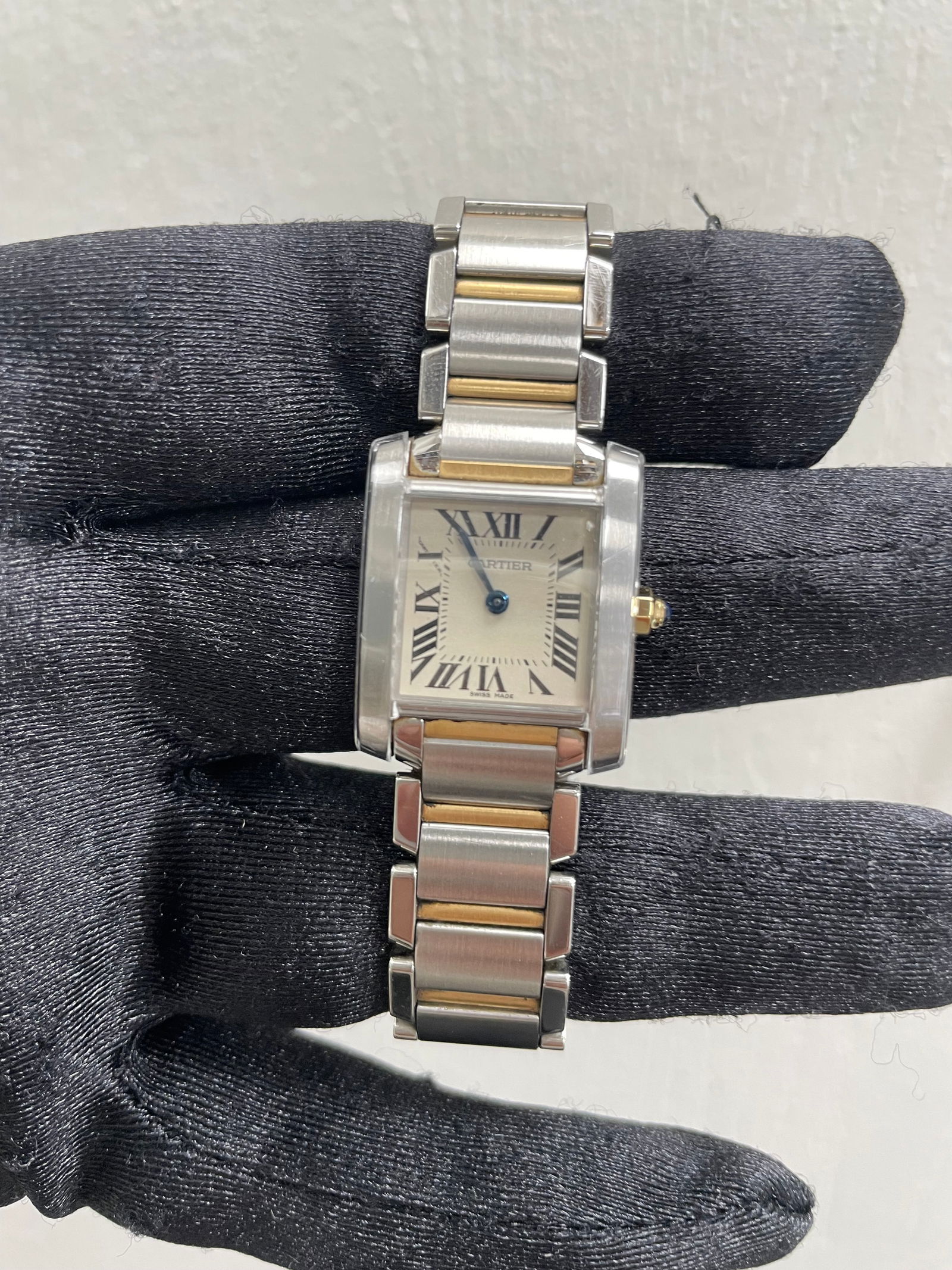 2020 Cartier Tank Reference 3217 18K Yellow Gold Stainless Watch with Card: 2020 Cartier Tank Reference 3217 18K Yellow Gold Stainless Watch with Card This Cartier Tank watch features a white dial and reference number 3217. Crafted from a combination of 18K yellow gold and st