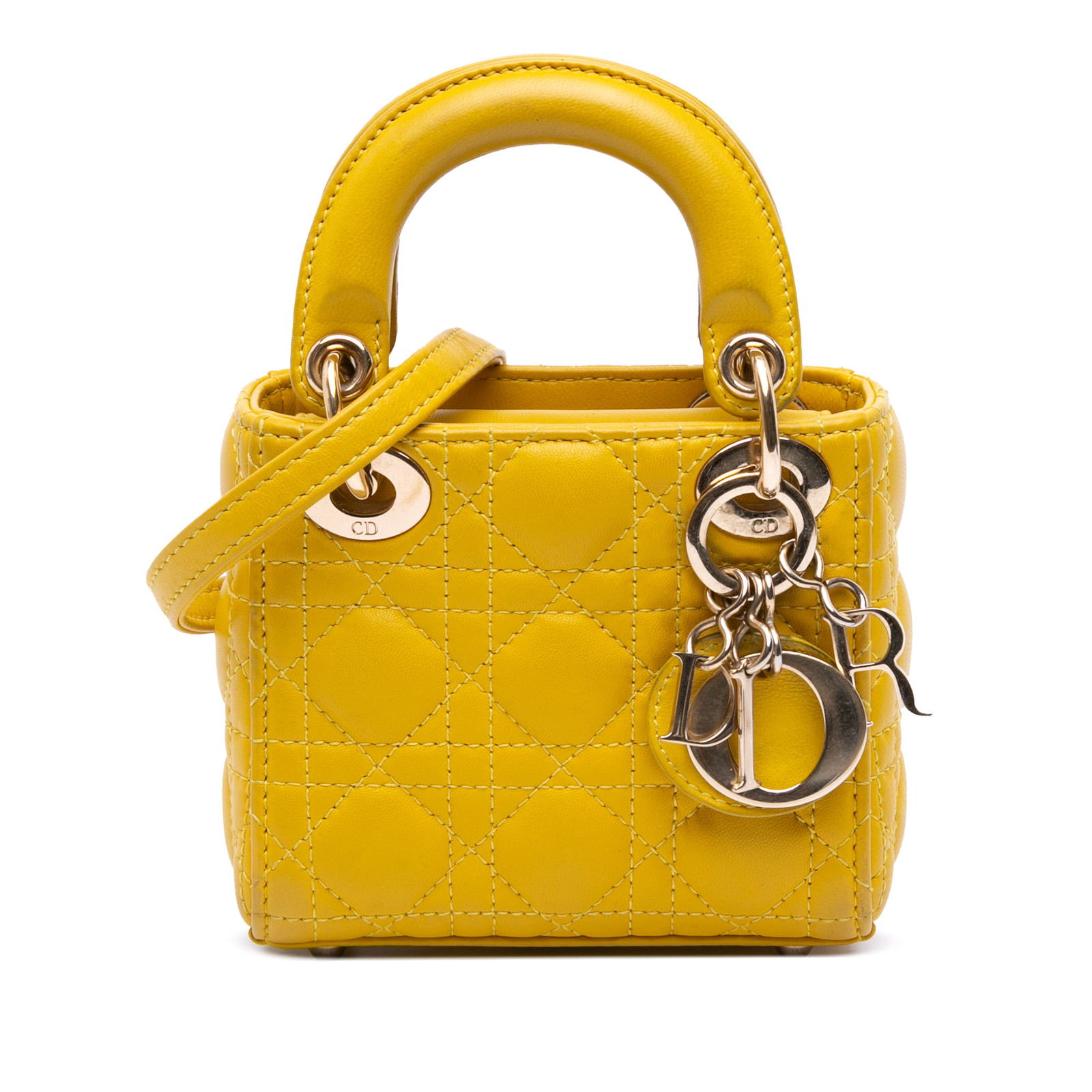 Dior Micro Lambskin Cannage Lady Dior Yellow Bag: Dior Micro Lambskin Cannage Lady Dior Yellow Bag Introducing the Micro Lambskin Cannage Lady Dior, a luxurious handbag crafted from exquisite quilted lambskin leather. This compact bag features elegan