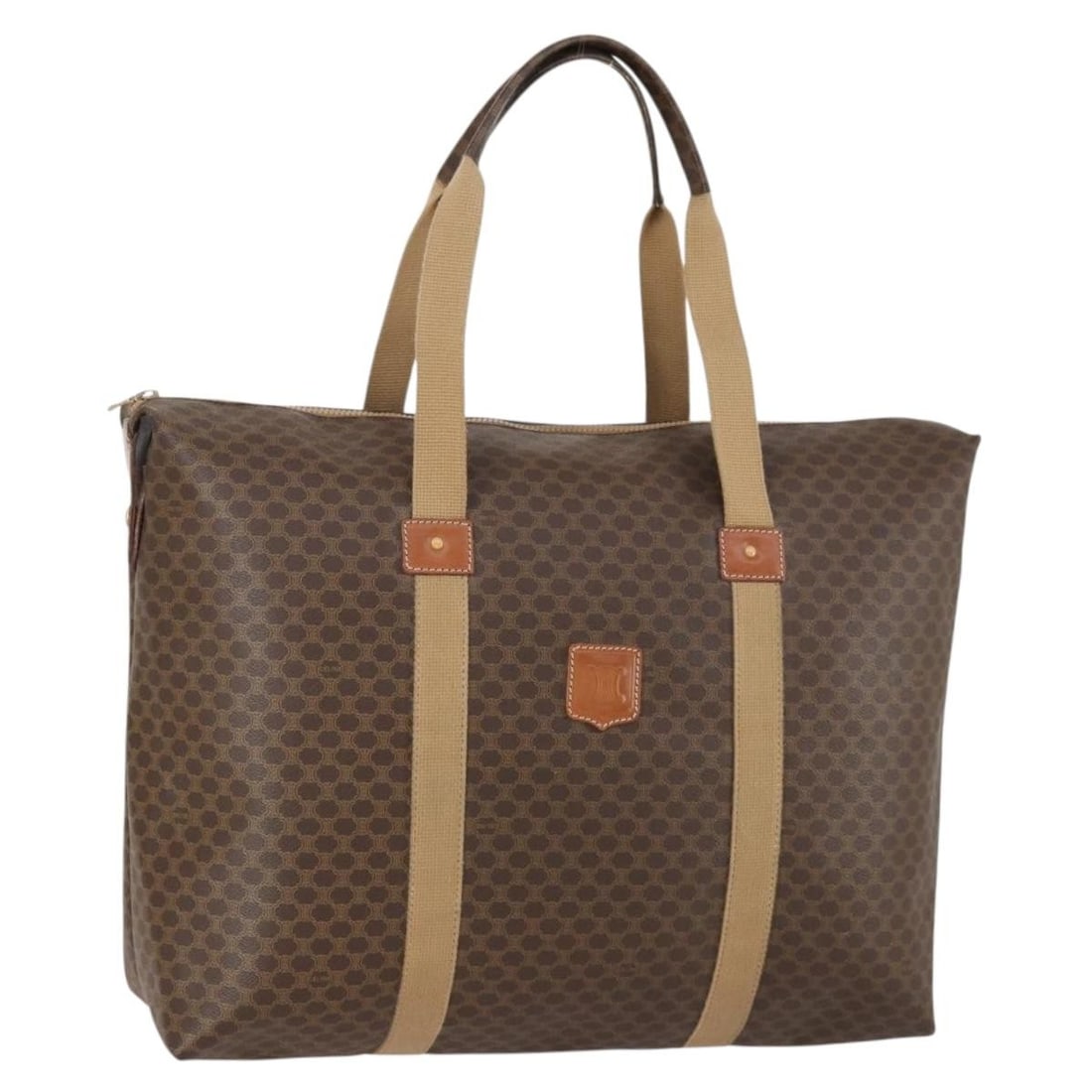 Vintage Macadam Tote by Celine in Brown: Vintage Macadam Tote by Celine in Brown This pre-owned Celine Macadam tote bag in brown features the iconic design and is crafted for female use. It is in good condition overall, with some signs of us