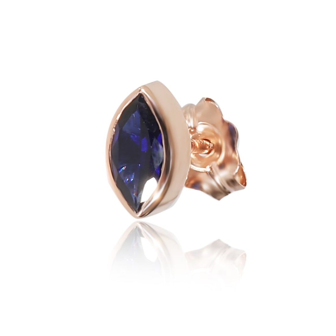 Single Marquise Lab Sapphire Stud Earring in 14K Rose Gold 0.28 Carat: Single Marquise Lab Sapphire Stud Earring in 14K Rose Gold 0.28 Carat This pre-owned single stud earring features a marquise-shaped lab created sapphire set in 14K rose gold. The earring is designed i