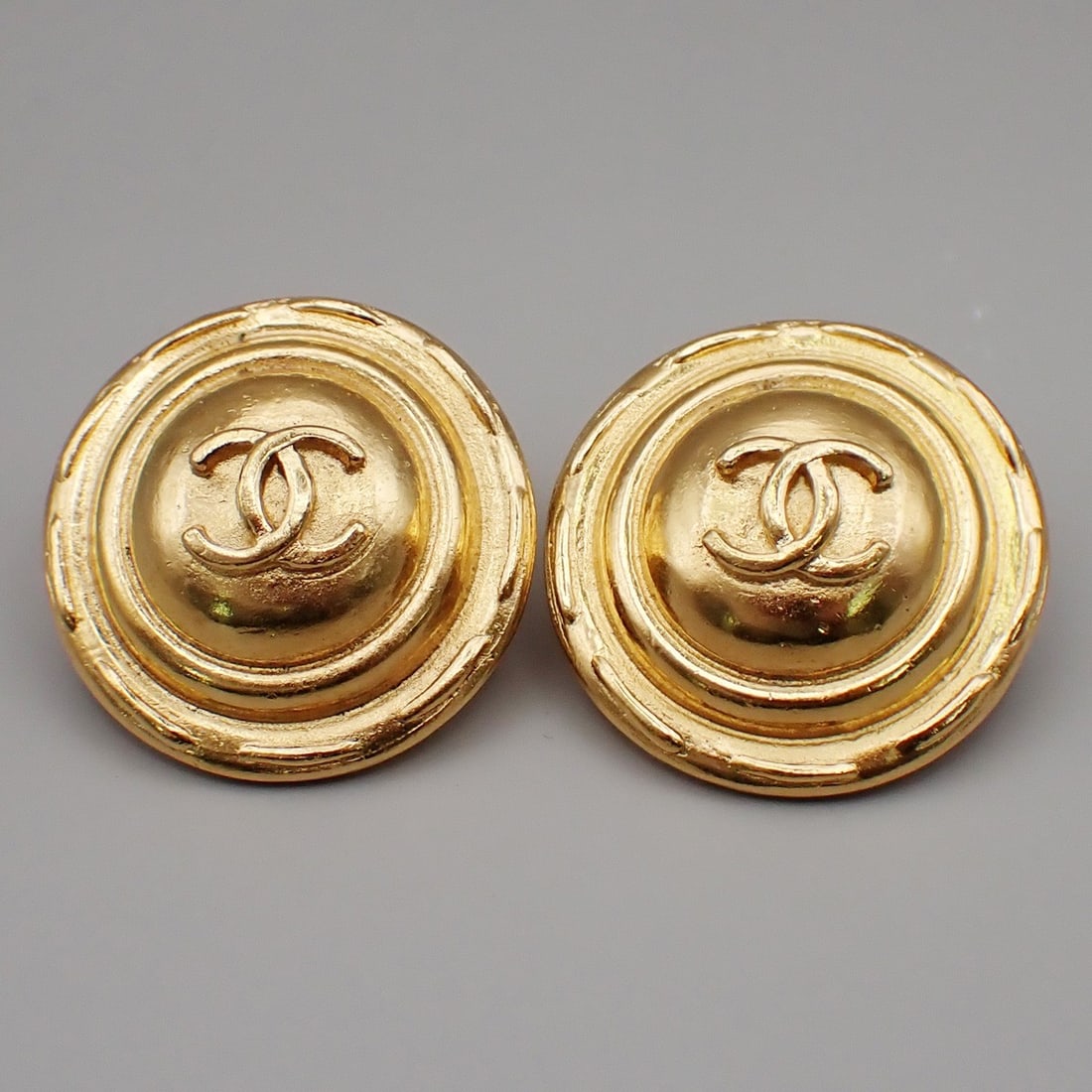 Round Clip-On Earrings with CC Motif by Chanel Vintage Gold Tone (1 of 1)