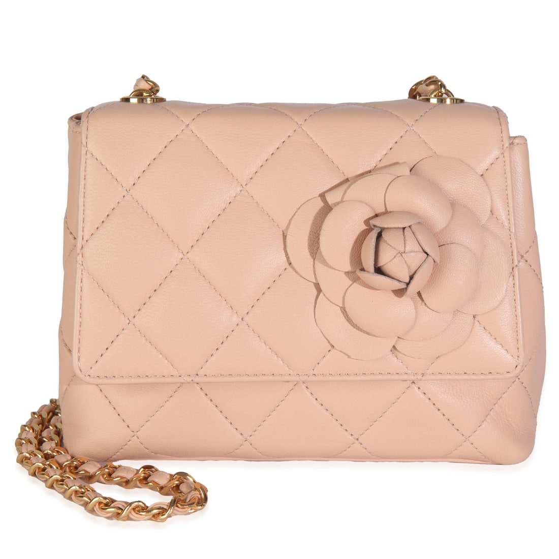 Chanel Mini Camellia Flap Bag Vintage Beige Lambskin Gold-Tone: Chanel Mini Camellia Flap Bag Vintage Beige Lambskin Gold-Tone This vintage Chanel Mini Camellia Flap Bag is a stunning accessory crafted from luxurious beige quilted lambskin leather. Originating fro